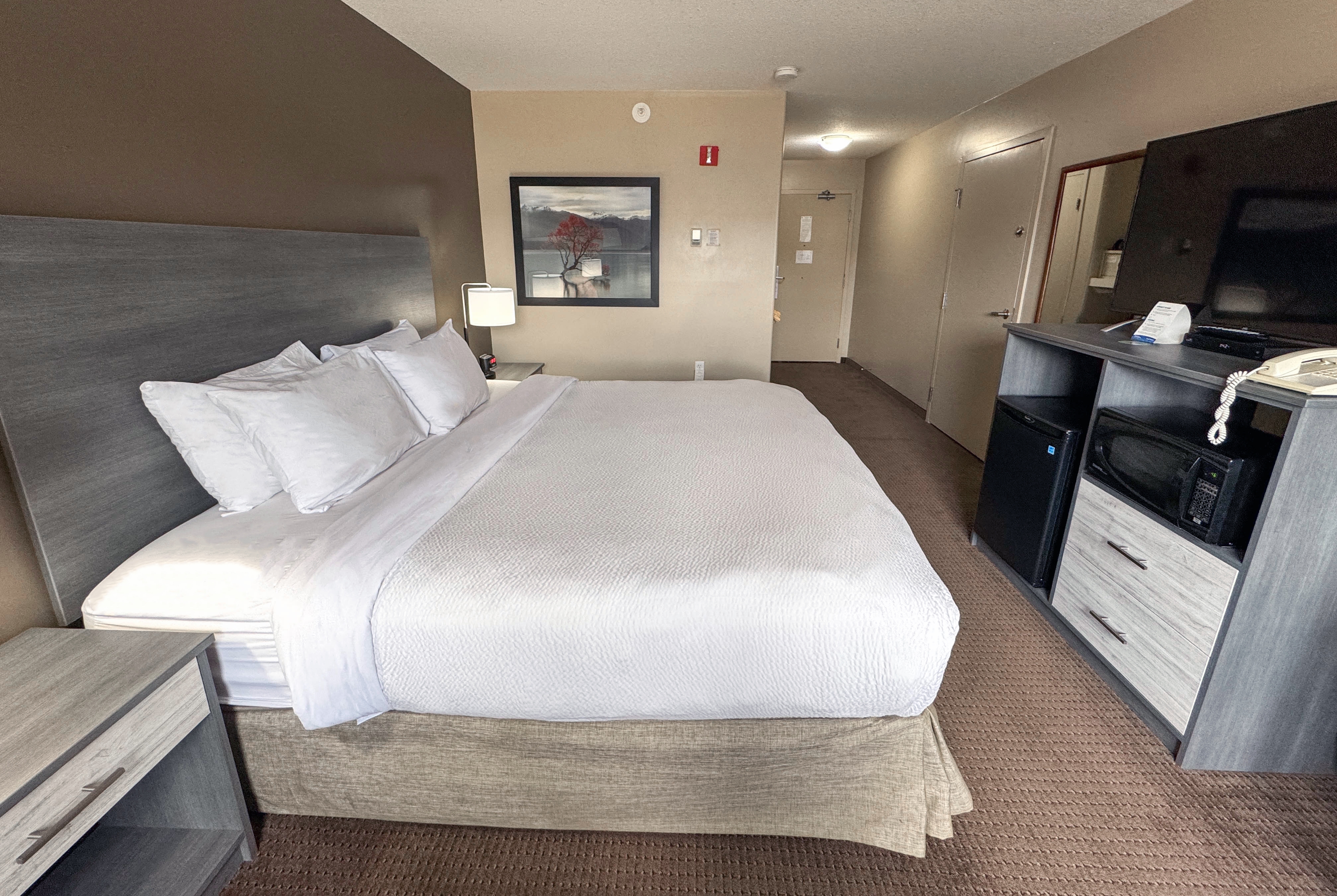 Guest room at the Ramada by Wyndham Sherwood Park in Sherwood Park, Alberta