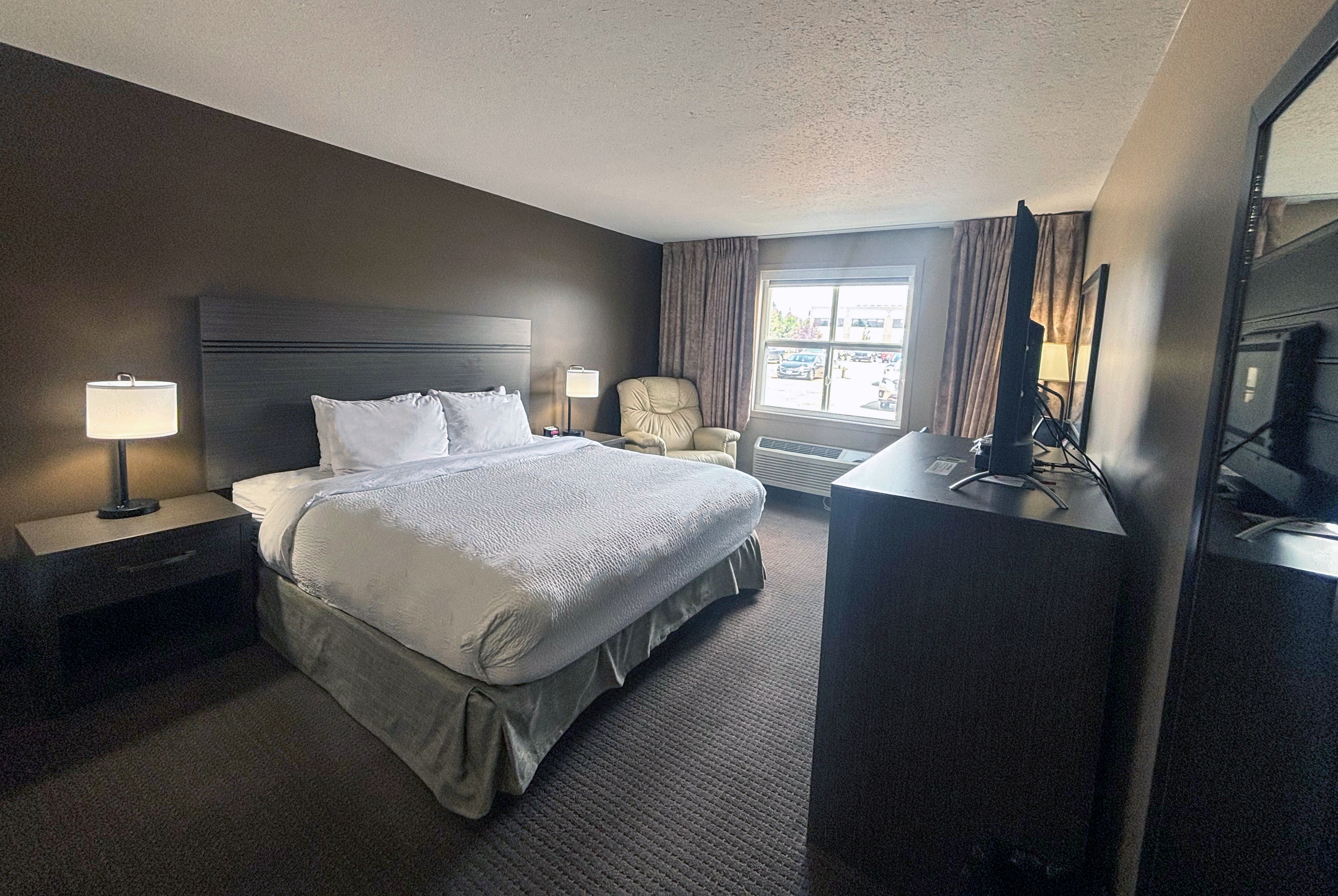 Guest room at the Ramada by Wyndham Sherwood Park in Sherwood Park, Alberta