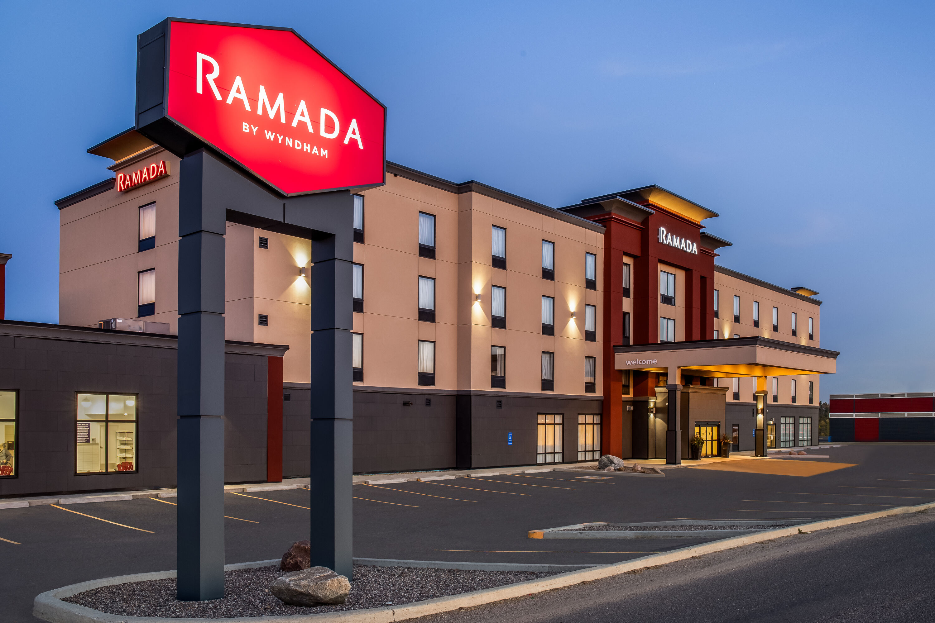 Exterior Dusk Image of Ramada by Wyndham St. Paul AB hotel in St Paul, Alberta
