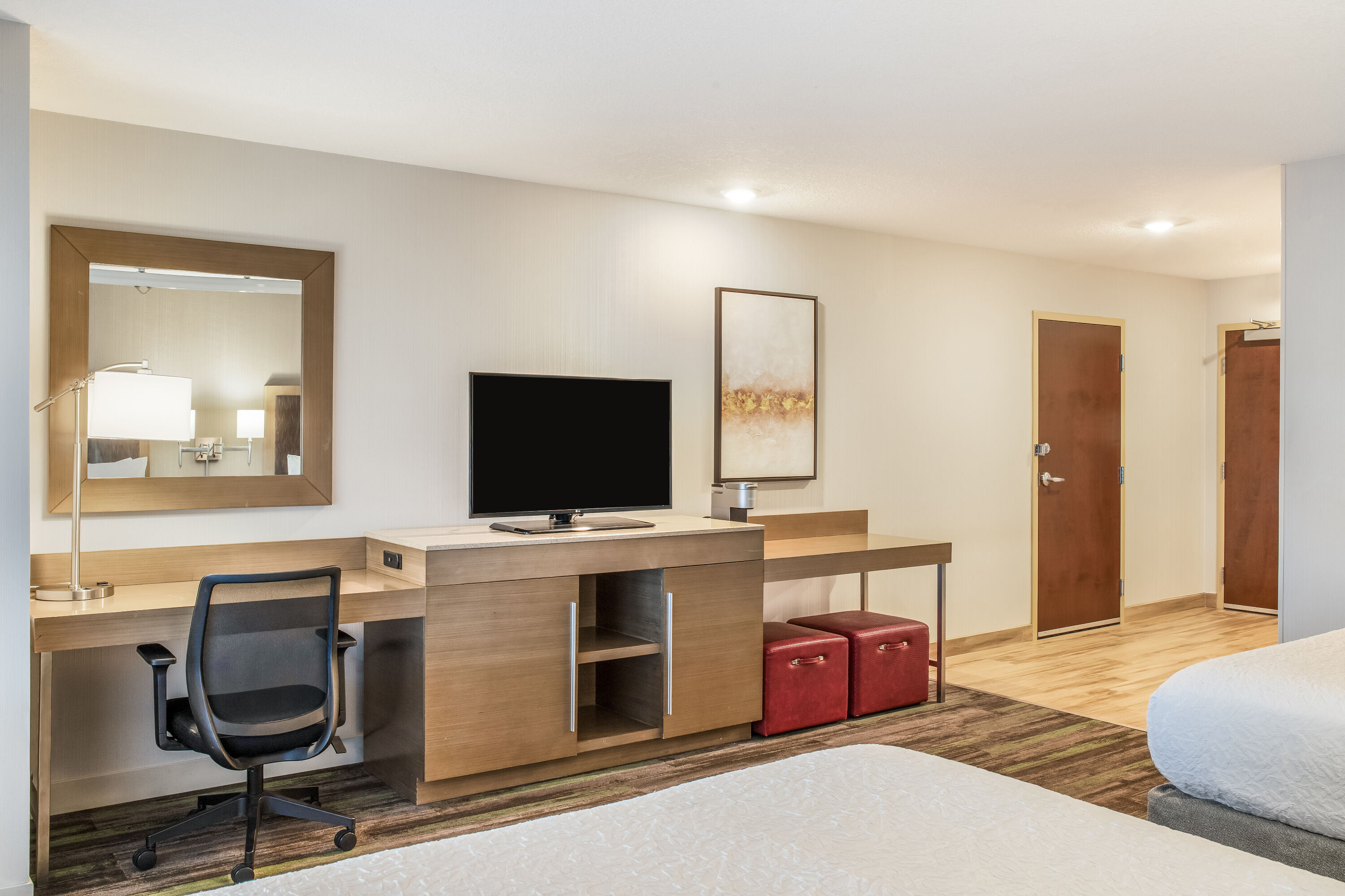 Queen bed guest room at the Ramada by Wyndham St. Paul AB in St Paul, Alberta