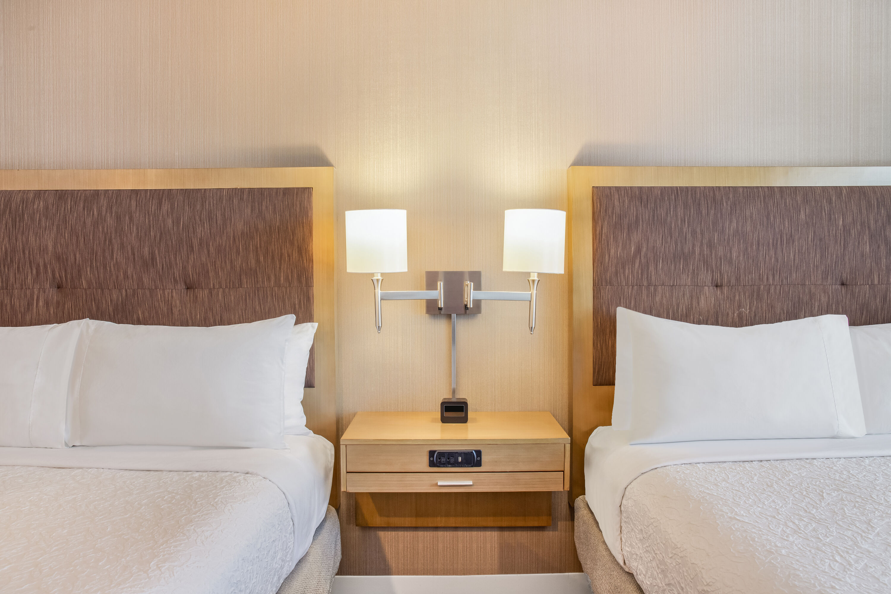 Queen bed guest room at the Ramada by Wyndham St. Paul AB in St Paul, Alberta