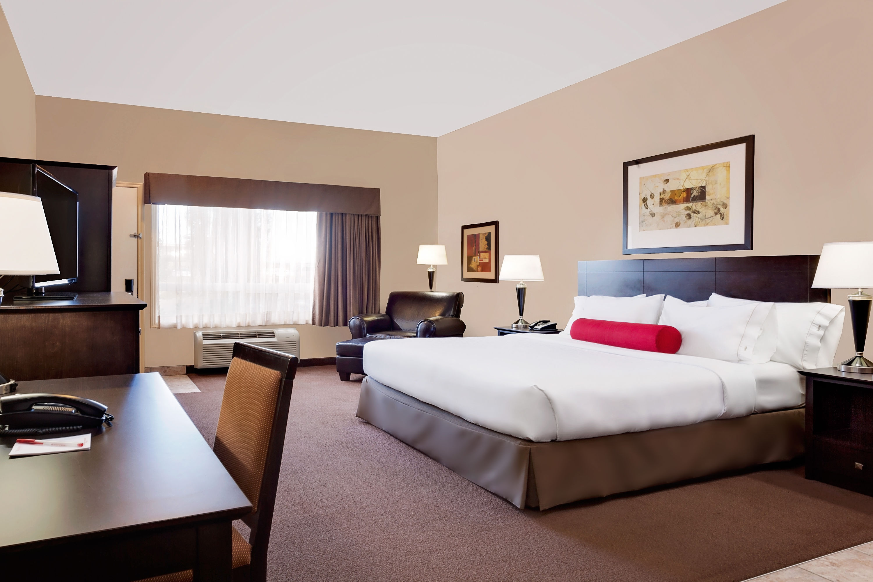 Guest room at the Ramada by Wyndham Stettler in Stettler, Alberta