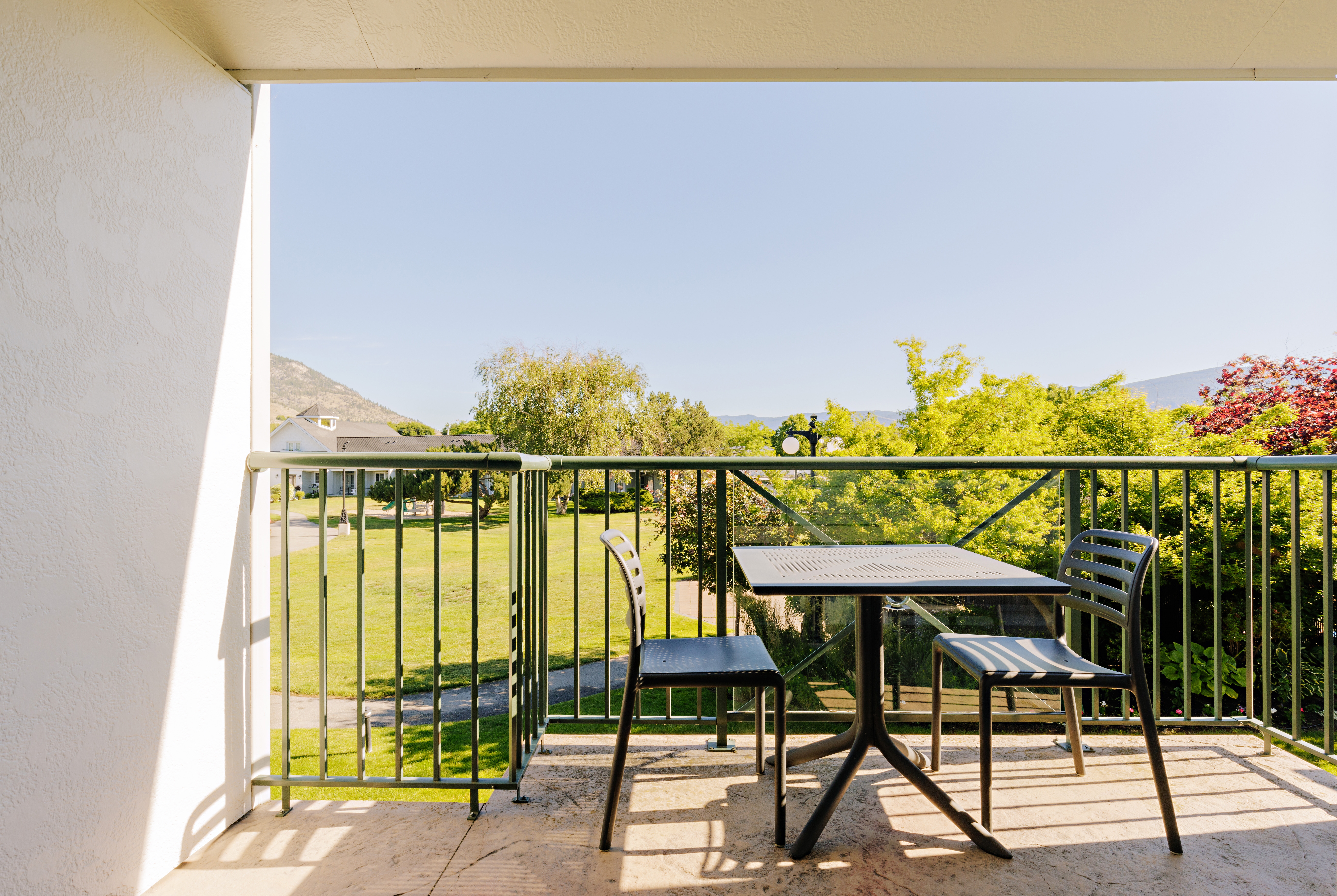 Guest room patio at the Balcomo, a Ramada by Wyndham in Penticton, British Columbia
