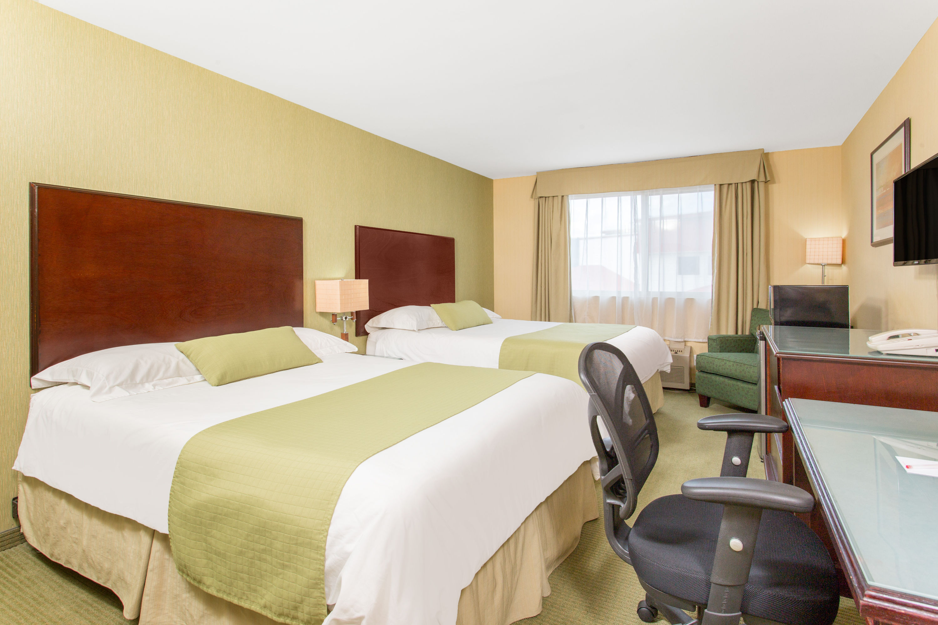 Guest room at the Ramada by Wyndham Williams Lake in Williams Lake, British Columbia