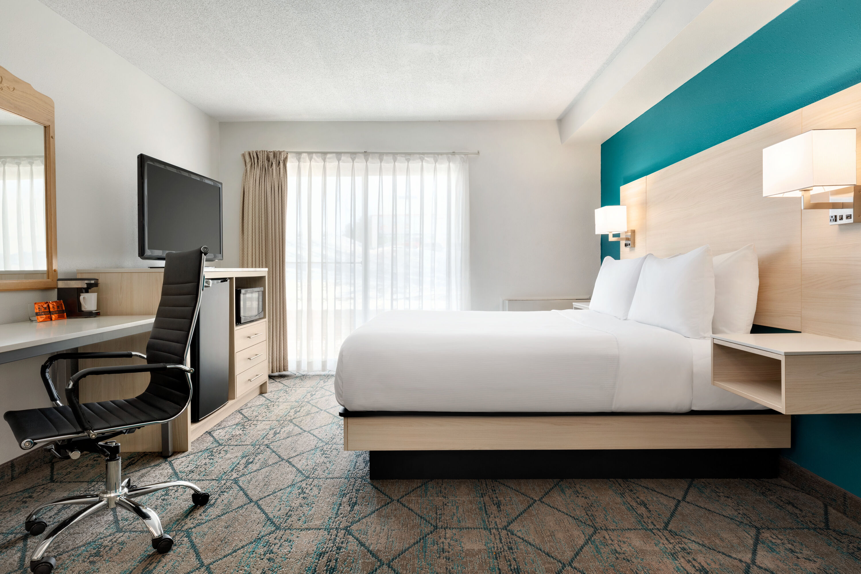 Guest room at the Ramada by Wyndham Miramichi New Brunswick in Miramichi, New Brunswick