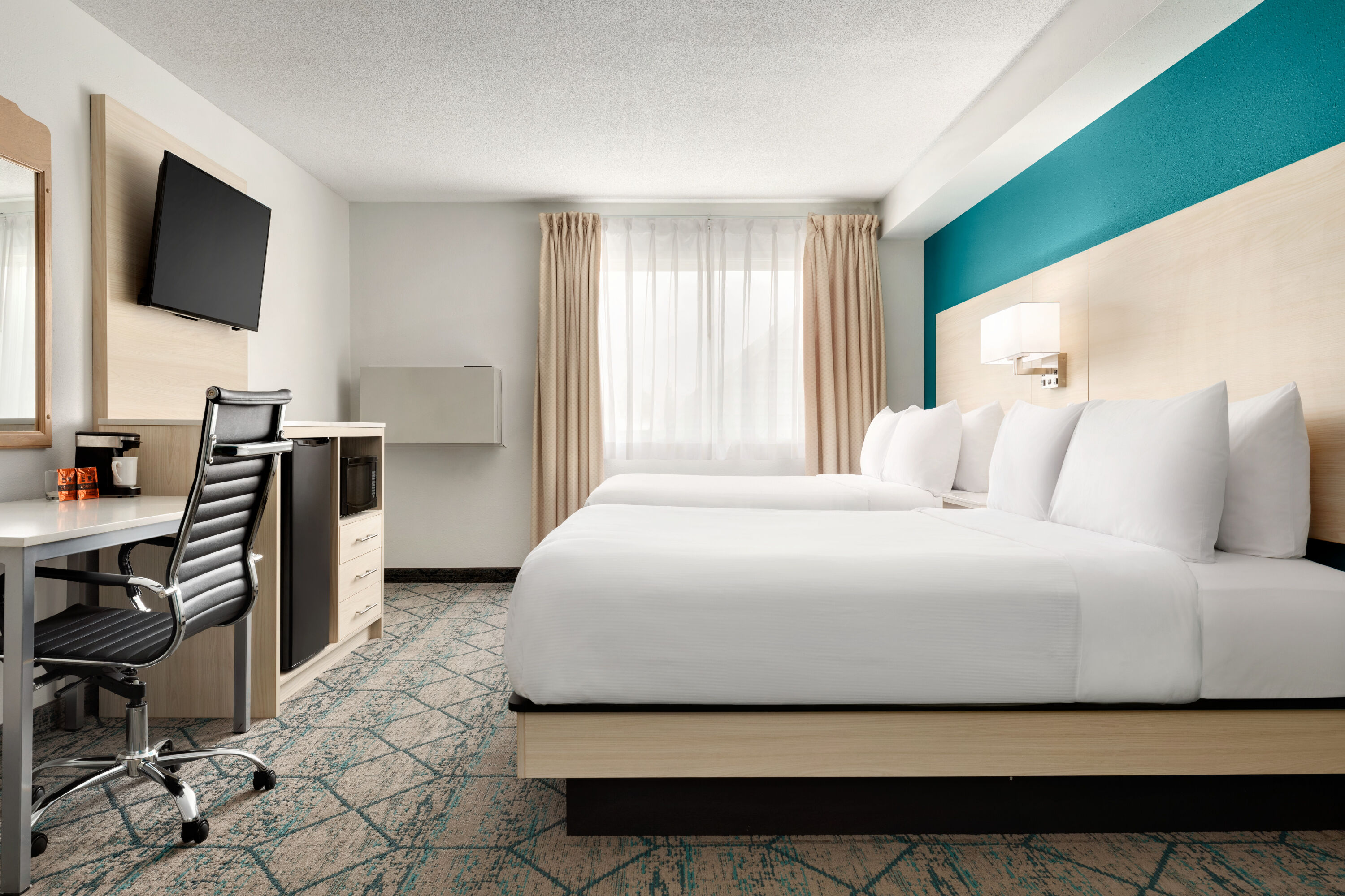 Guest room at the Ramada by Wyndham Miramichi New Brunswick in Miramichi, New Brunswick