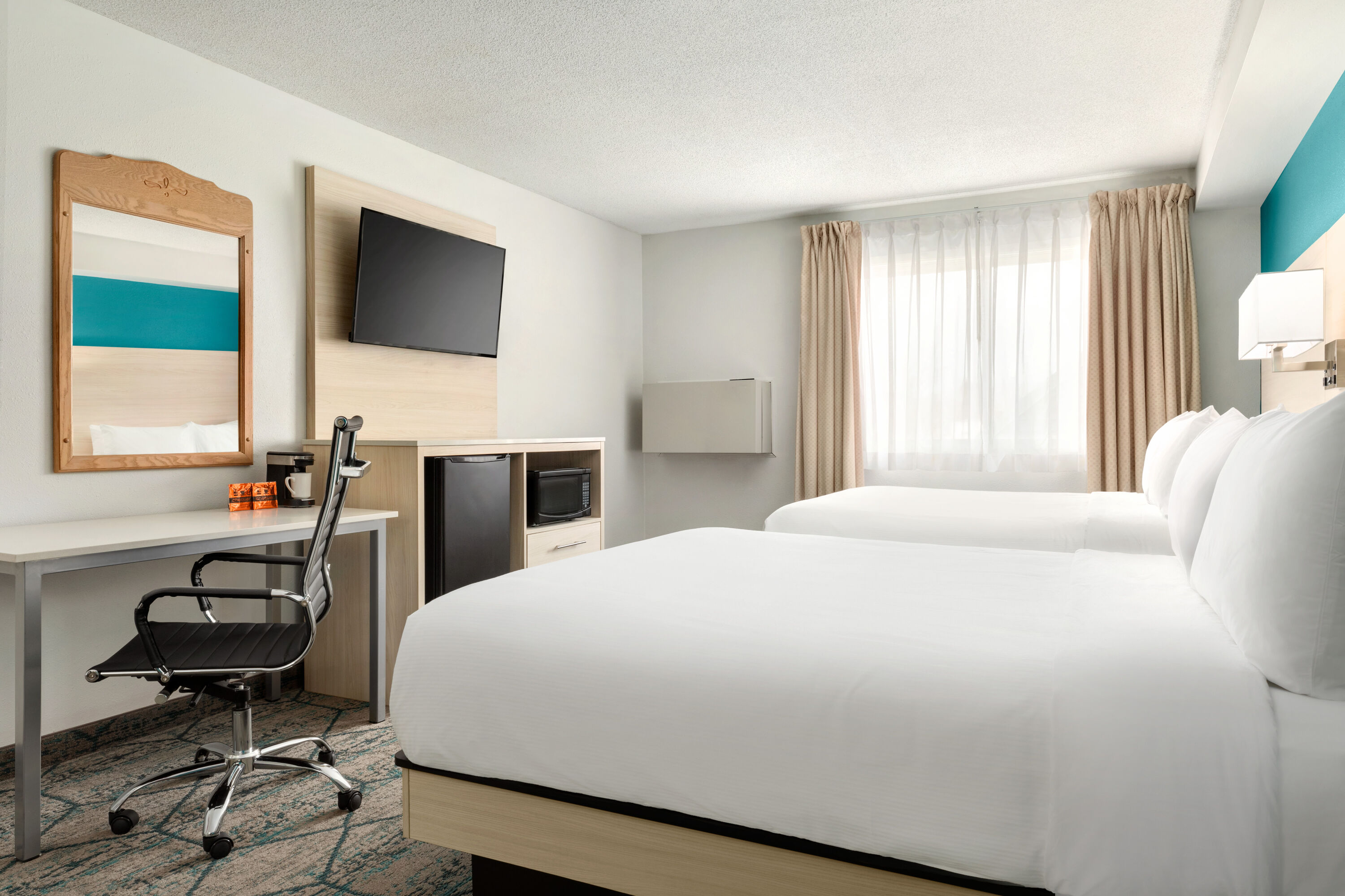 Guest room at the Ramada by Wyndham Miramichi New Brunswick in Miramichi, New Brunswick