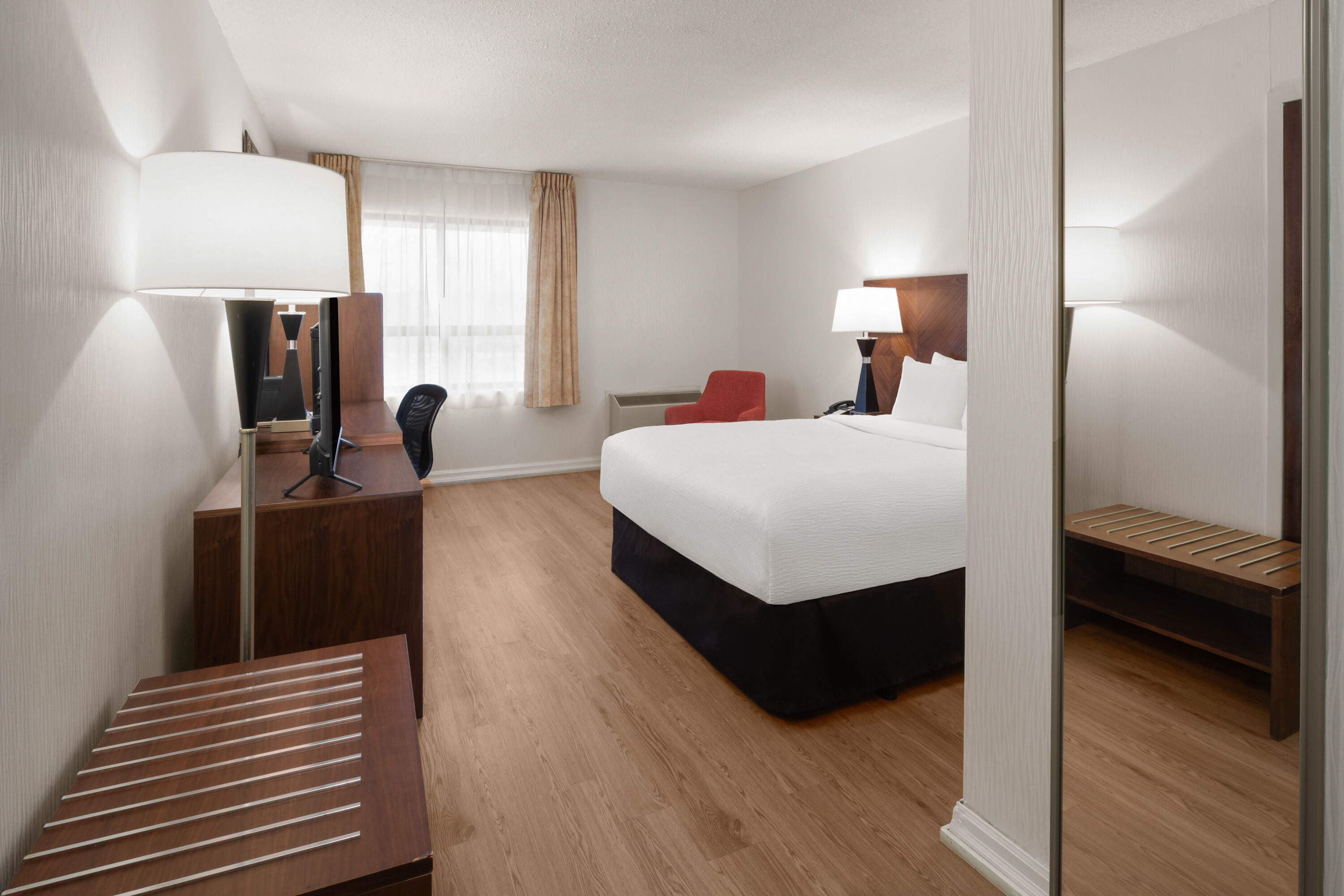 Guest room at the Ramada by Wyndham Arnprior in Arnprior, Ontario