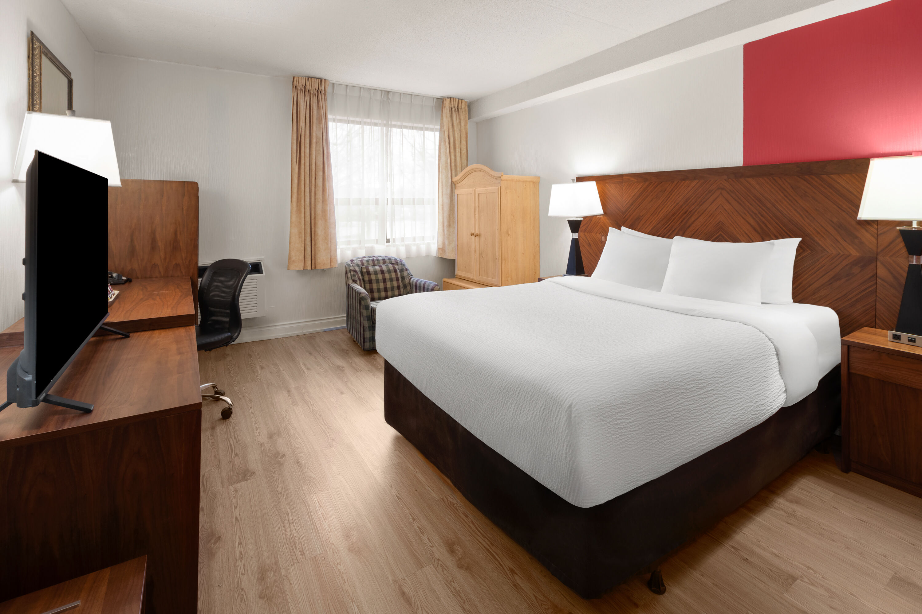 Guest room at the Ramada by Wyndham Arnprior in Arnprior, Ontario
