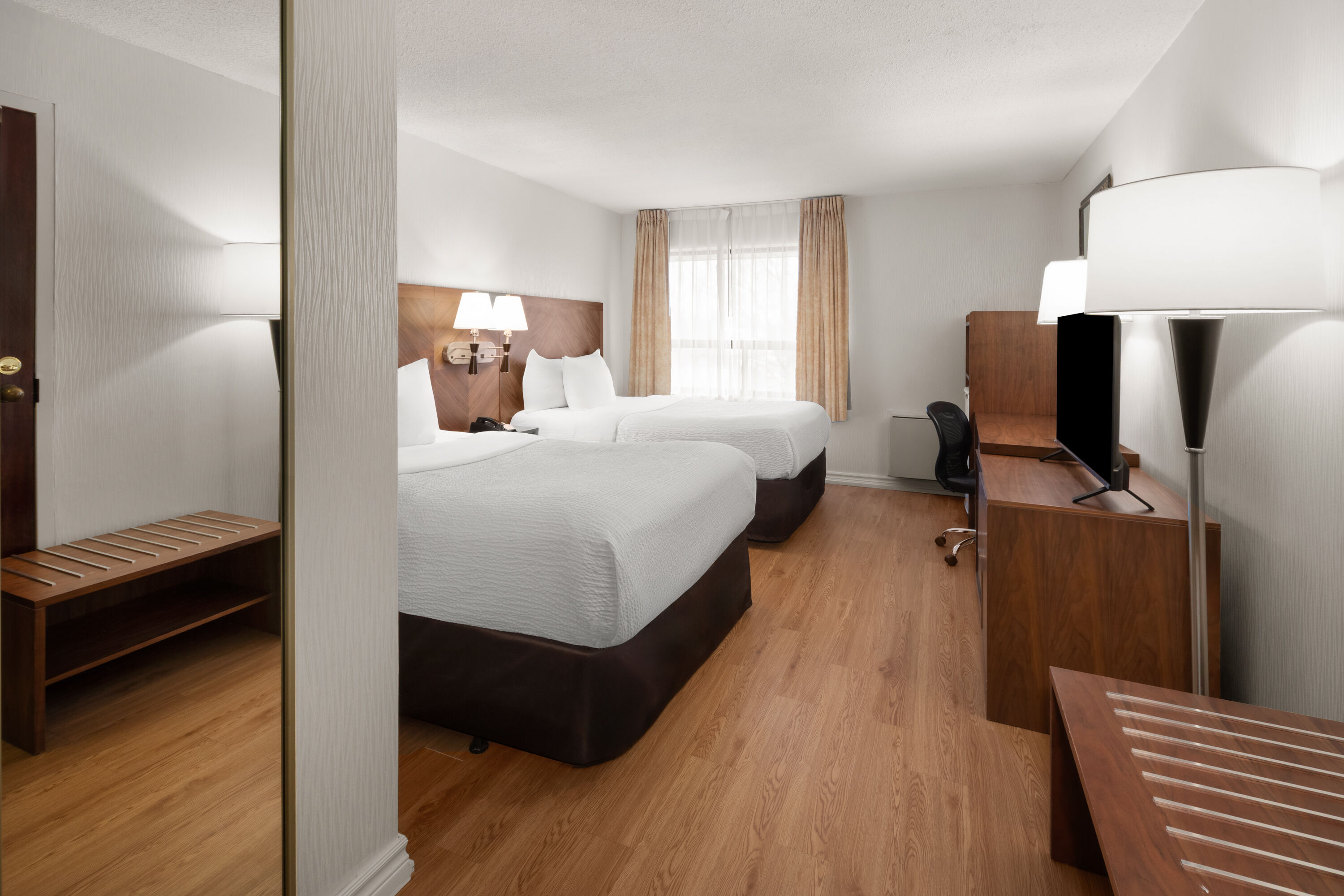 Guest room at the Ramada by Wyndham Arnprior in Arnprior, Ontario