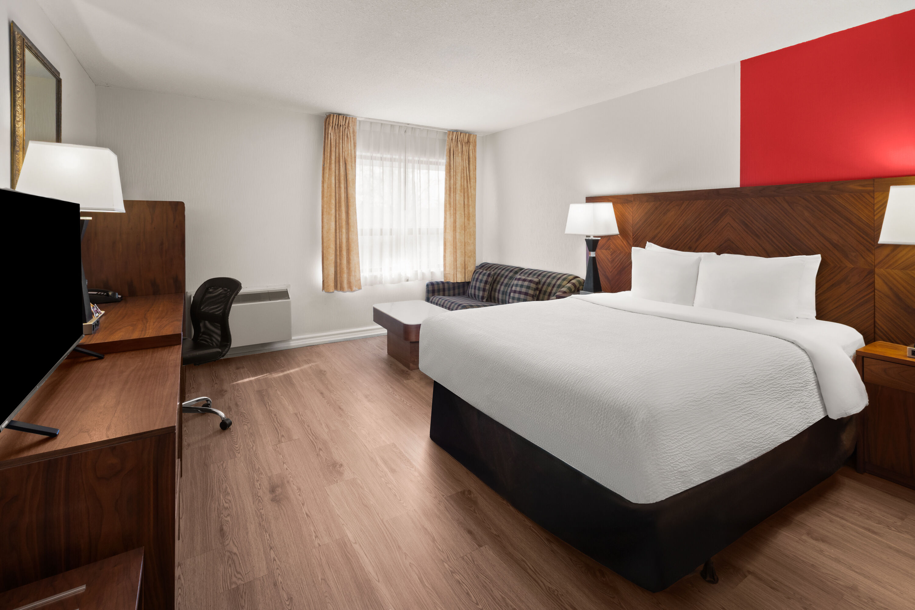 Guest room at the Ramada by Wyndham Arnprior in Arnprior, Ontario