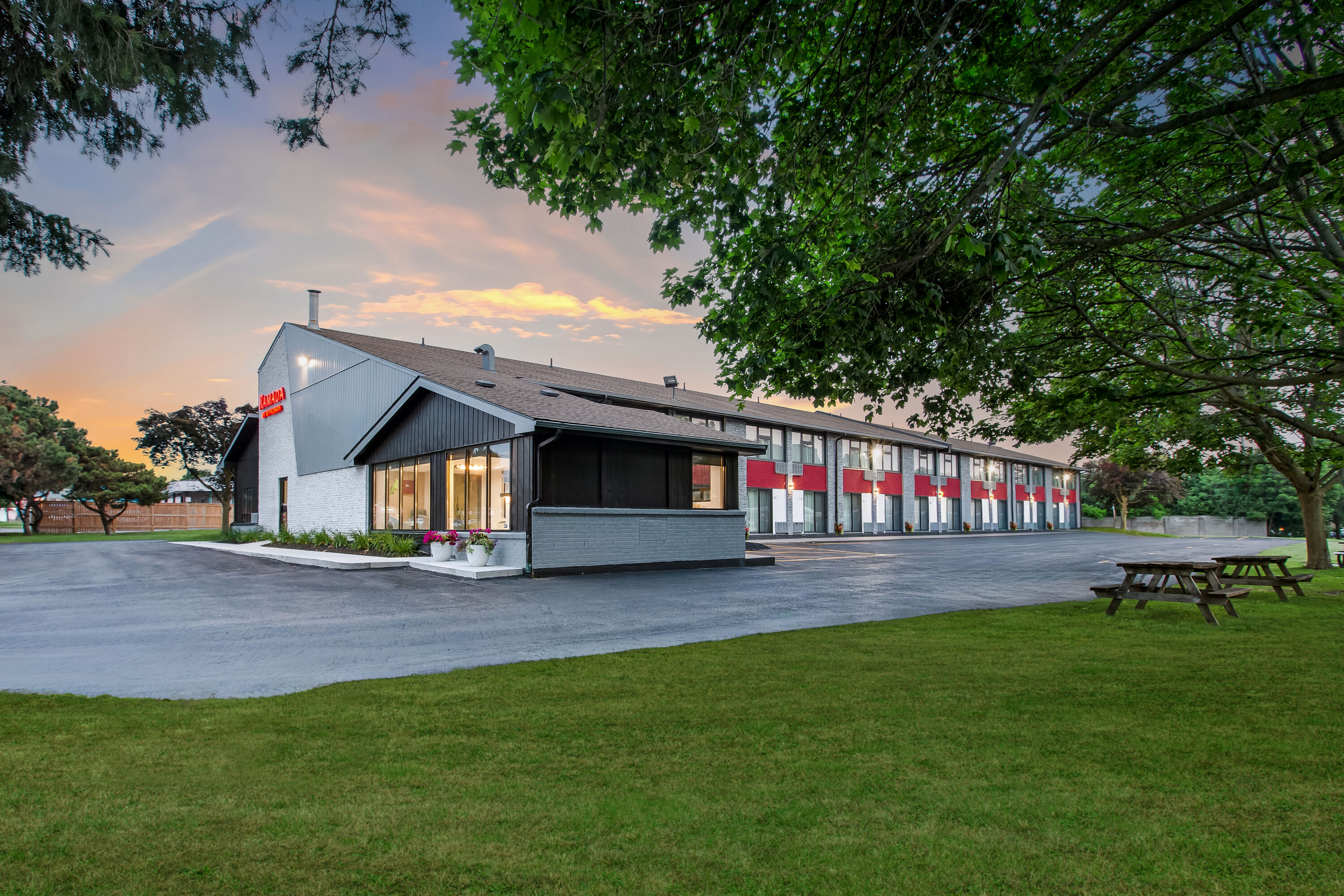 Exterior Dusk Image of Ramada by Wyndham Kingston hotel in Kingston, Ontario