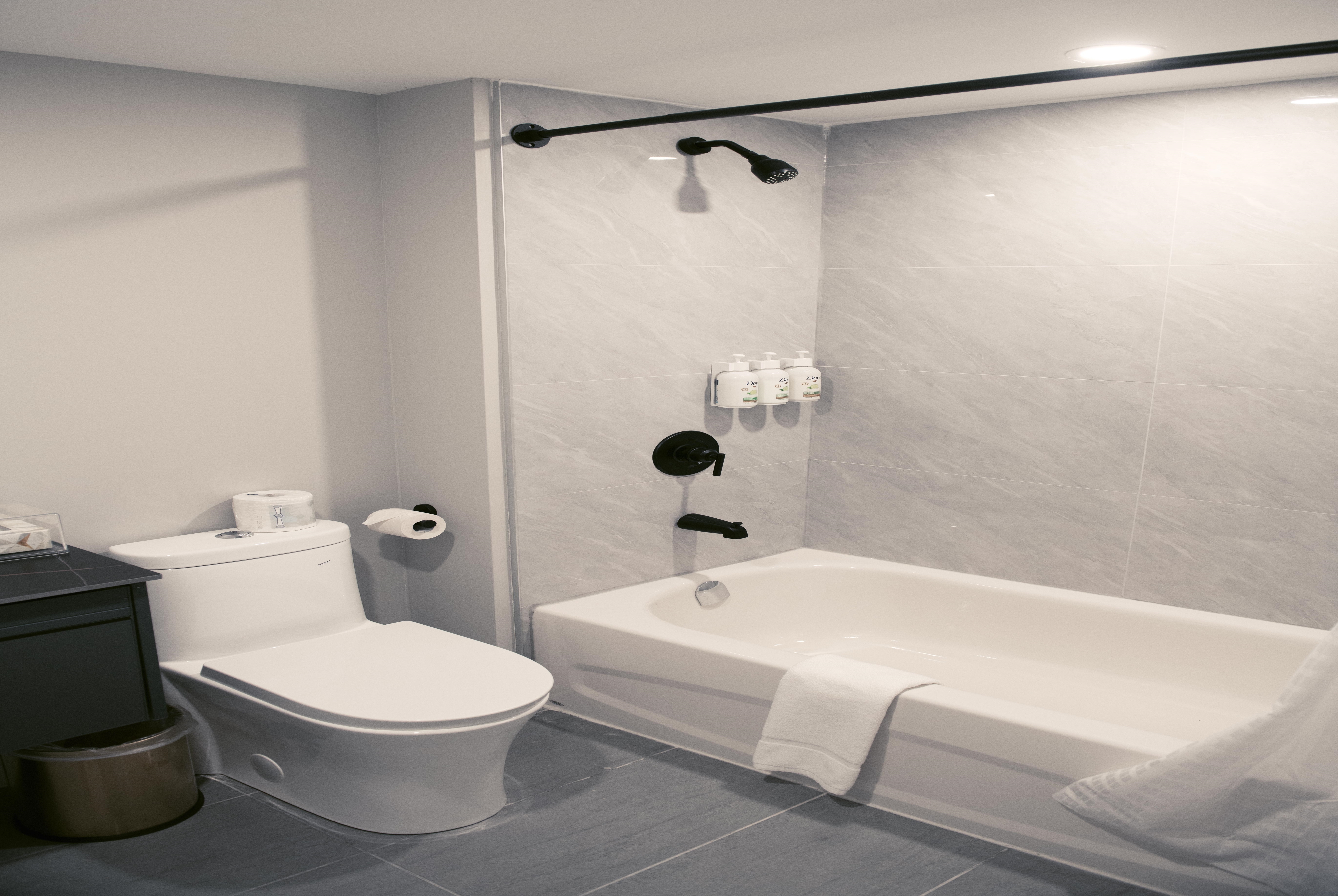 Guest room bath at the Ramada by Wyndham Kirkland Lake in Kirkland Lake, Ontario