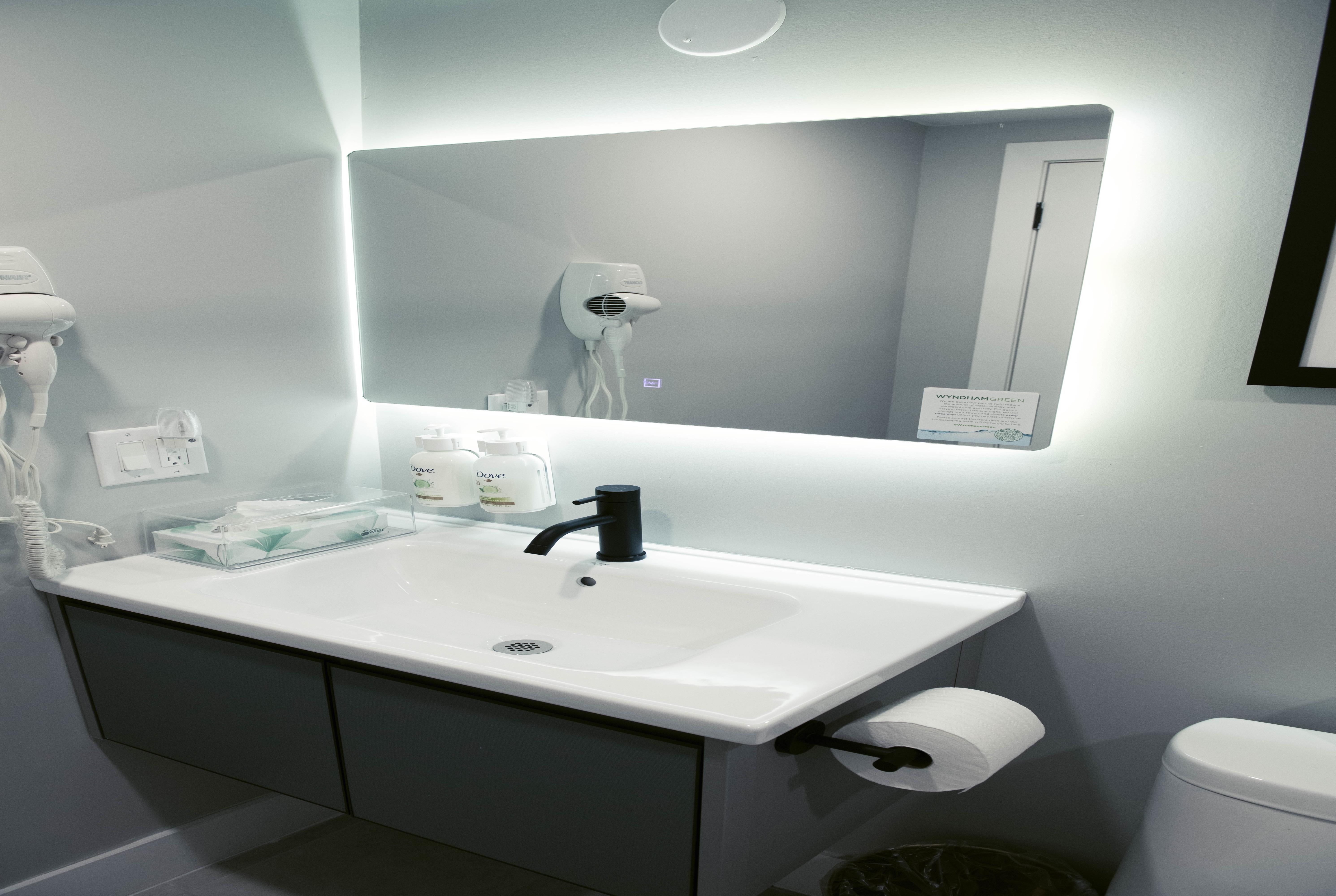 Guest room bath at the Ramada by Wyndham Kirkland Lake in Kirkland Lake, Ontario
