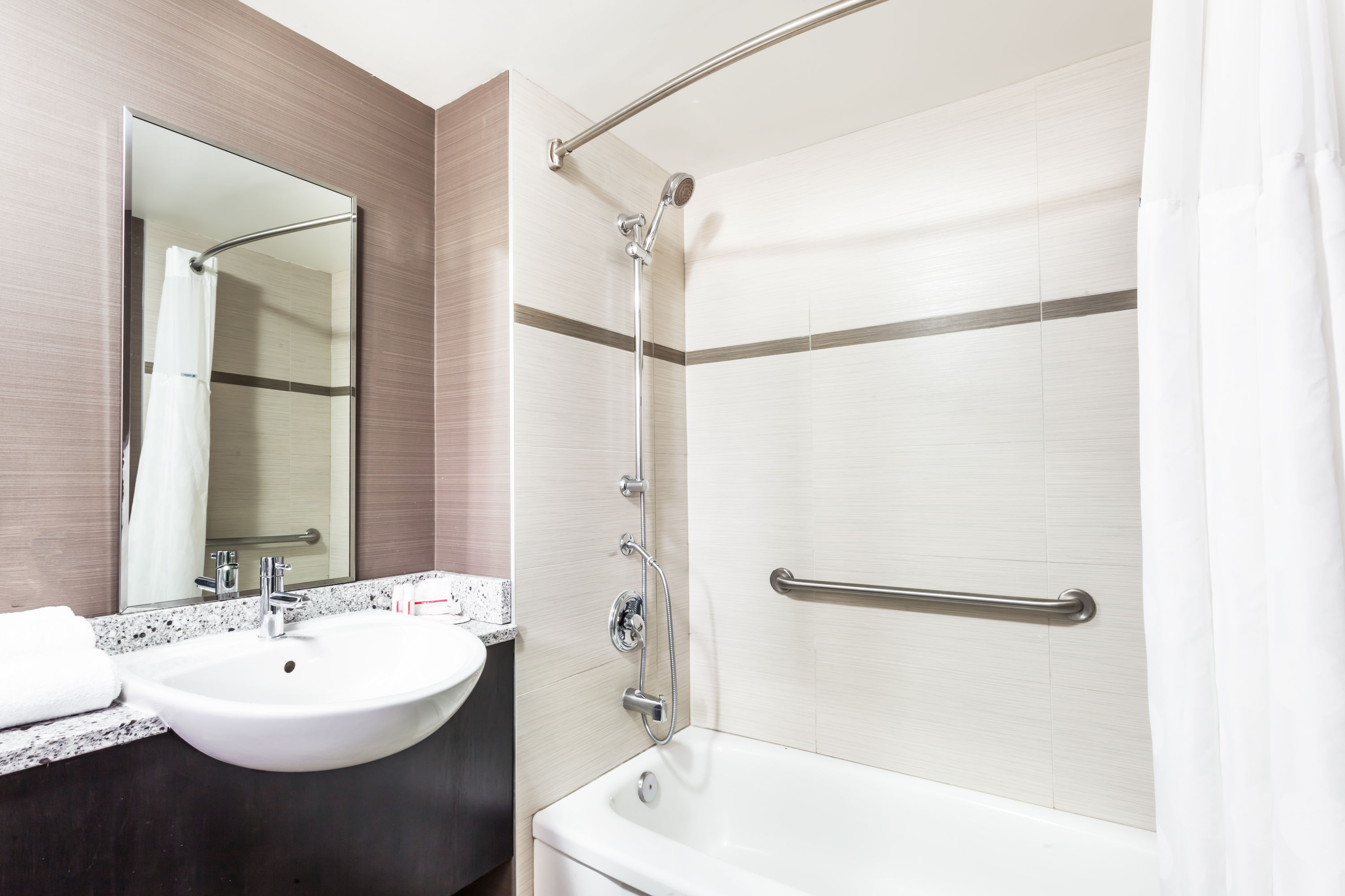 Guest room bath at the Ramada by Wyndham Ottawa On The Rideau in Ottawa, Ontario
