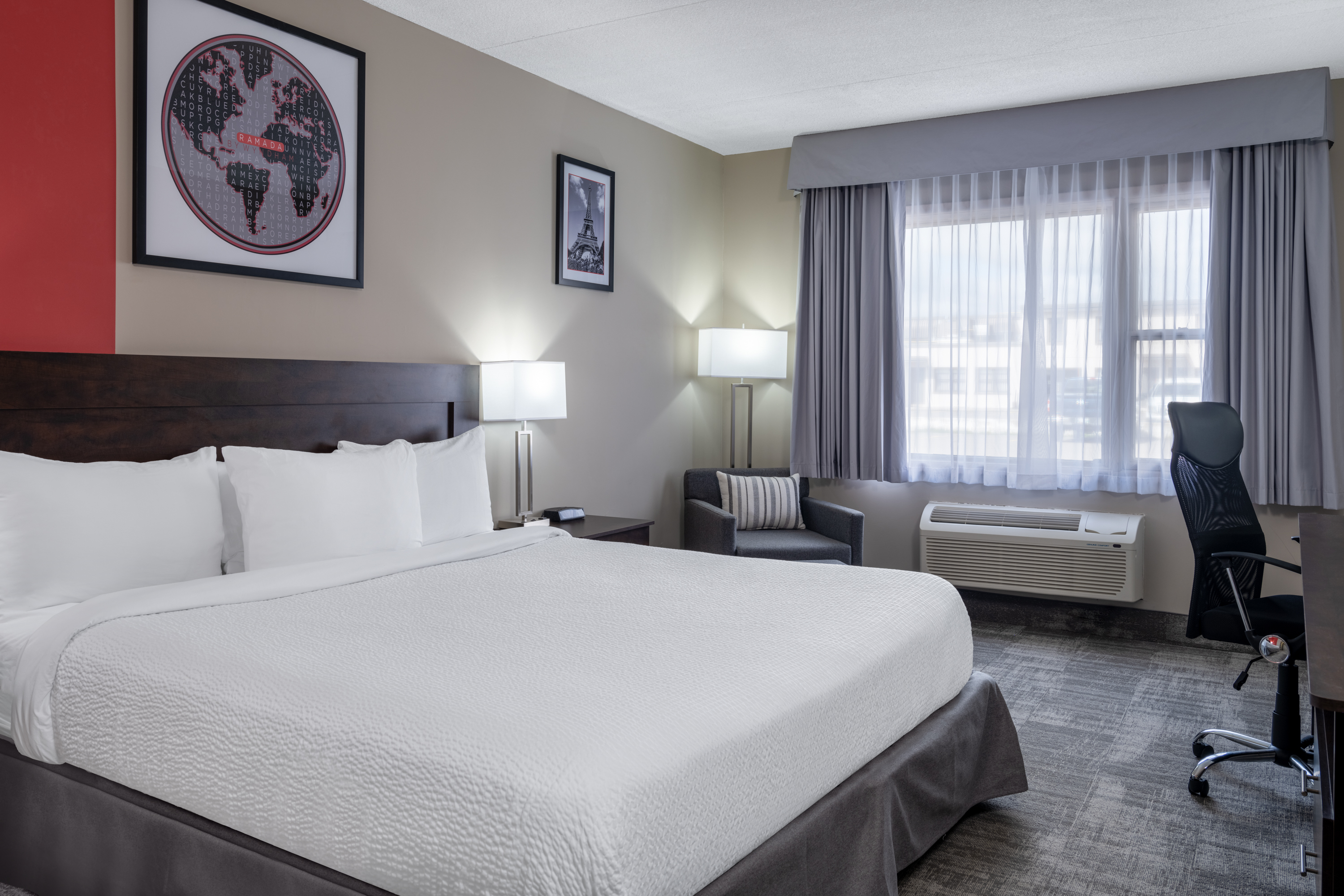 Guest room at the Ramada by Wyndham Thunder Bay Airlane Hotel in Thunder Bay, Ontario