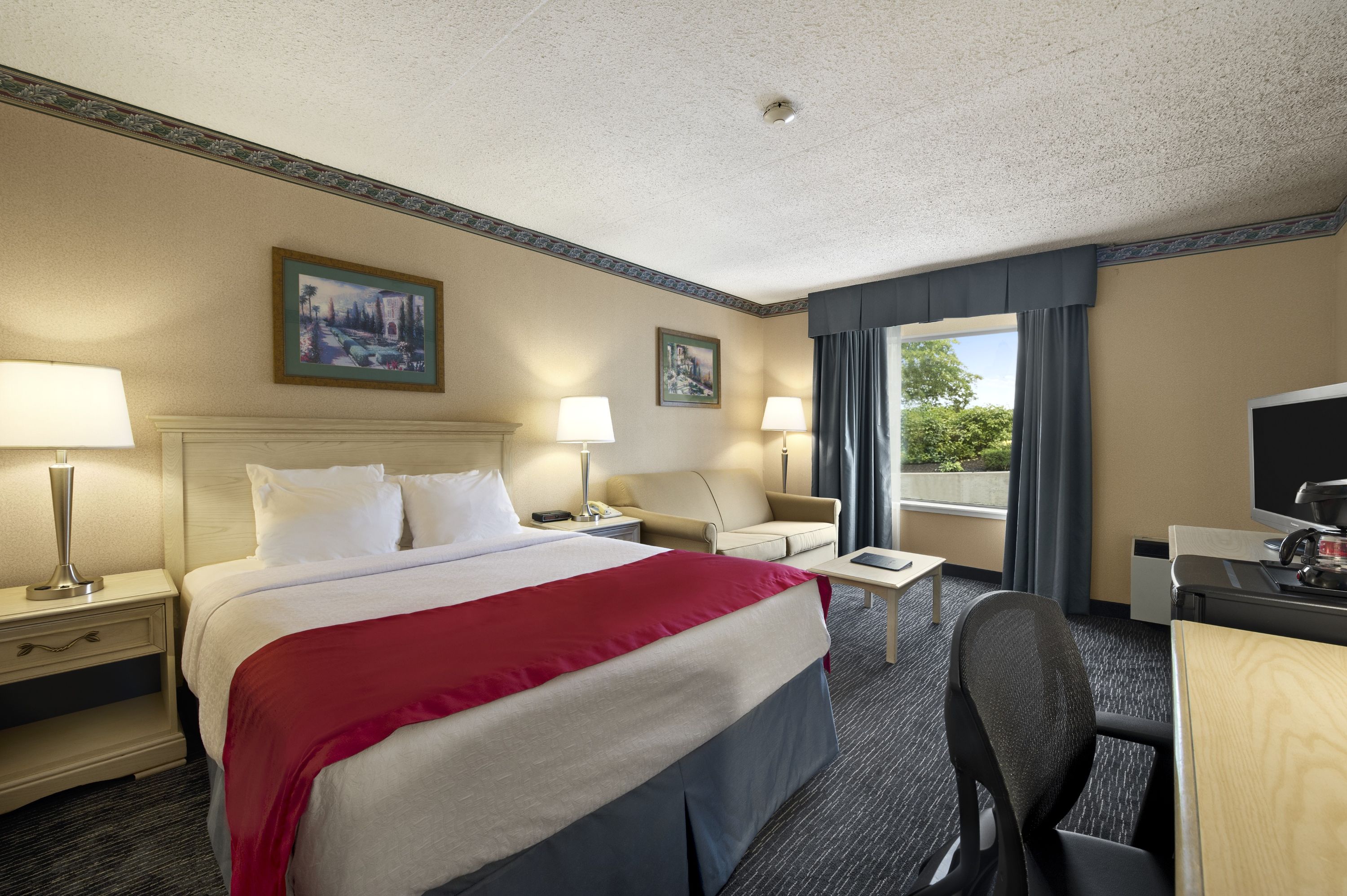 Guest room at the Ramada by Wyndham Trenton in Trenton, Ontario