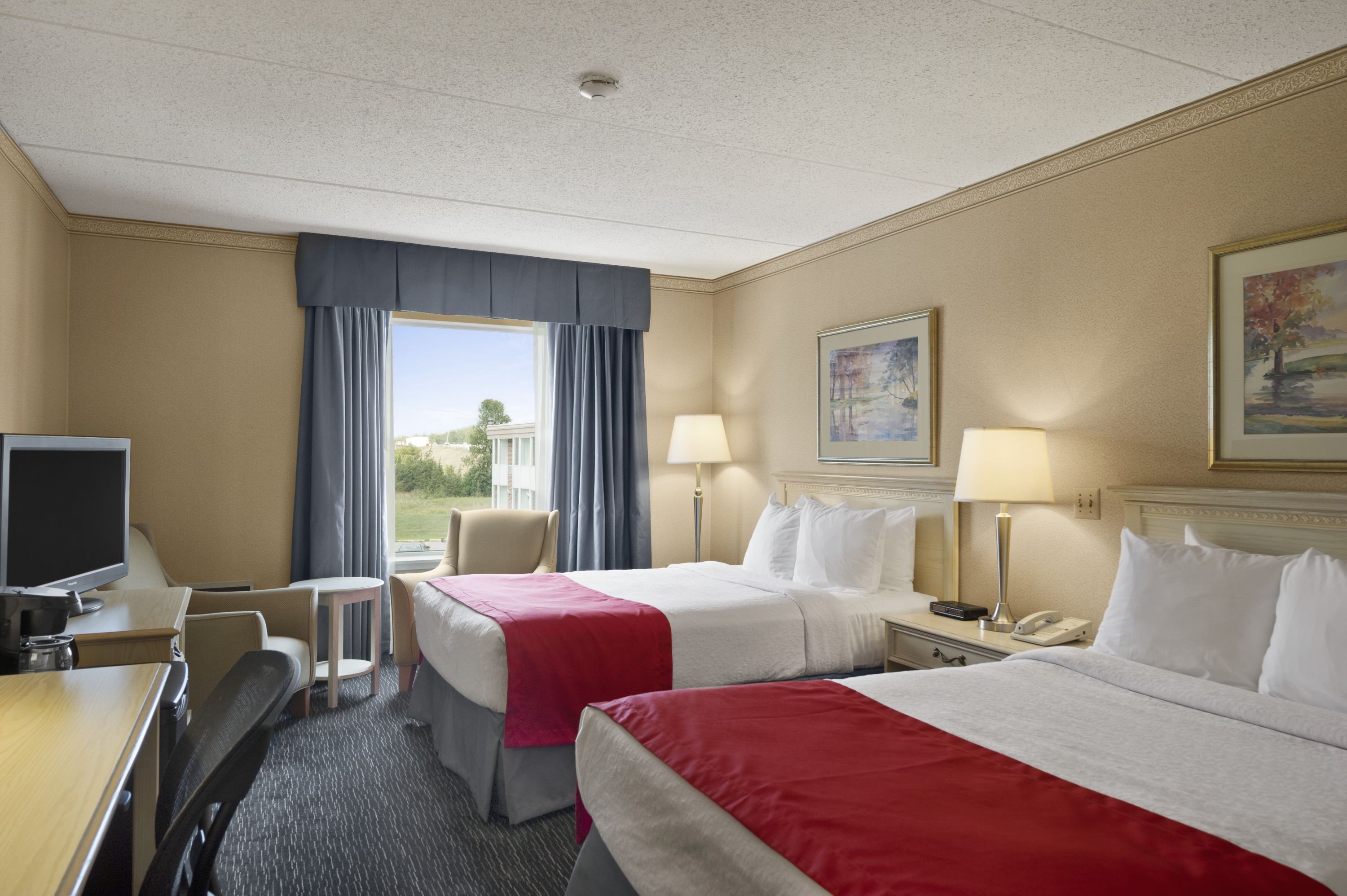 Guest room at the Ramada by Wyndham Trenton in Trenton, Ontario