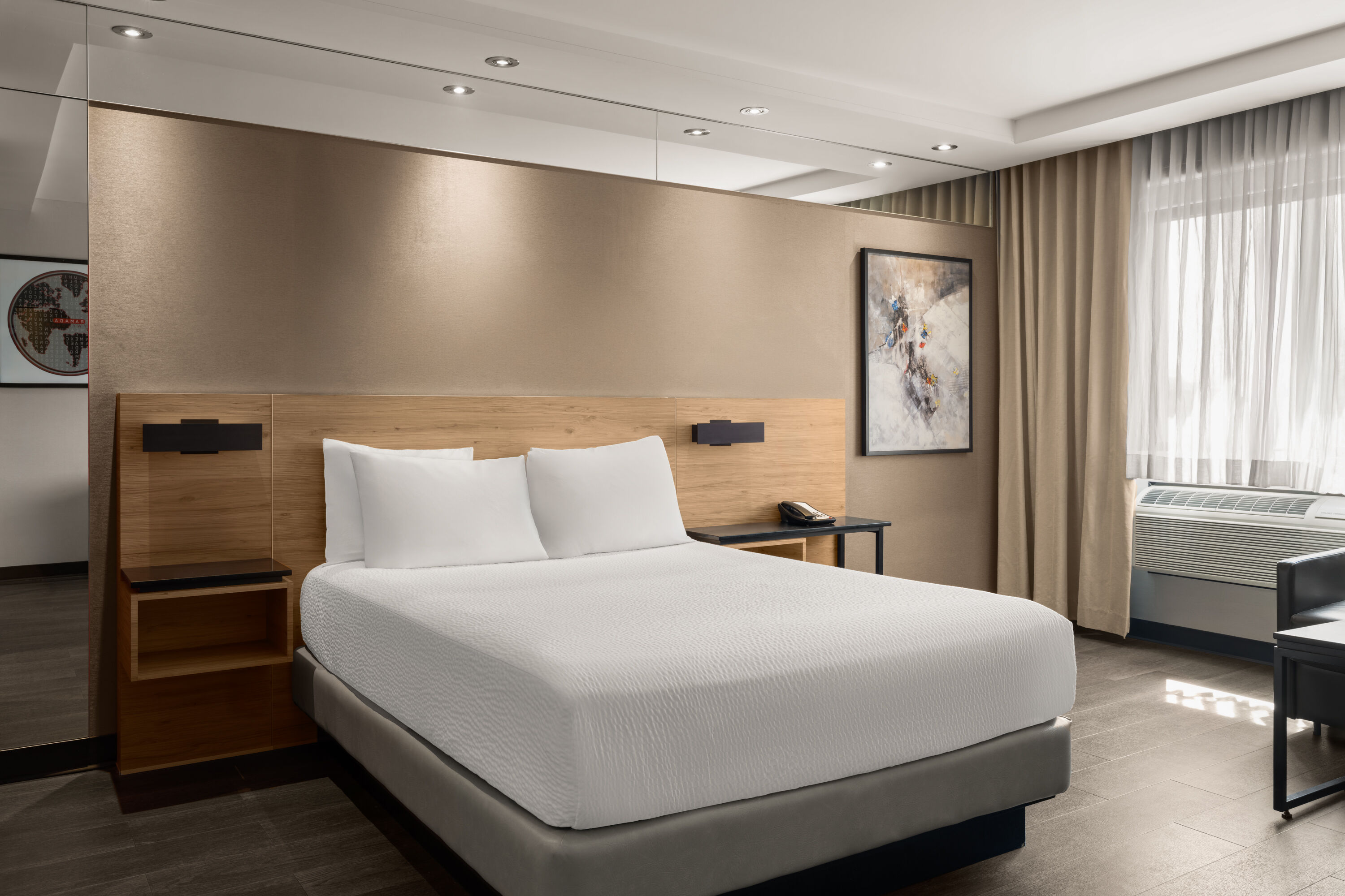 Guest room at the Ramada by Wyndham Laval in Laval, Quebec