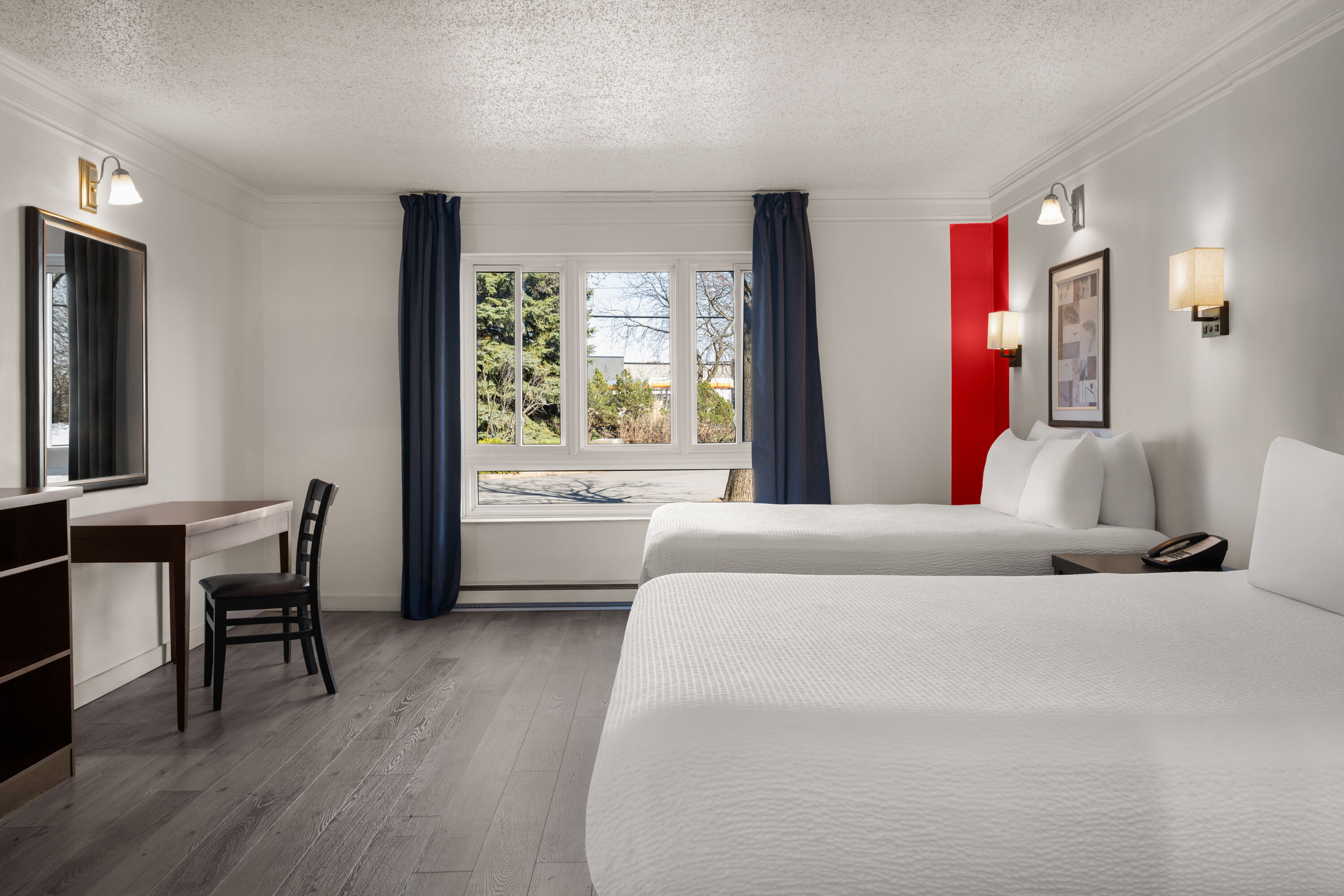 Guest room at the Ramada by Wyndham Laval in Laval, Quebec