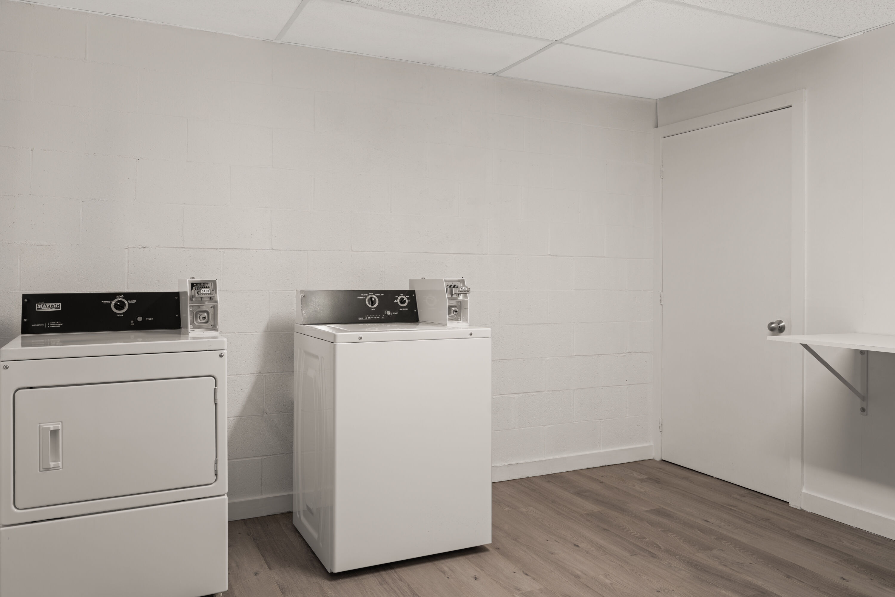 Laundry facilities at Ramada by Wyndham Laval in Laval, Quebec