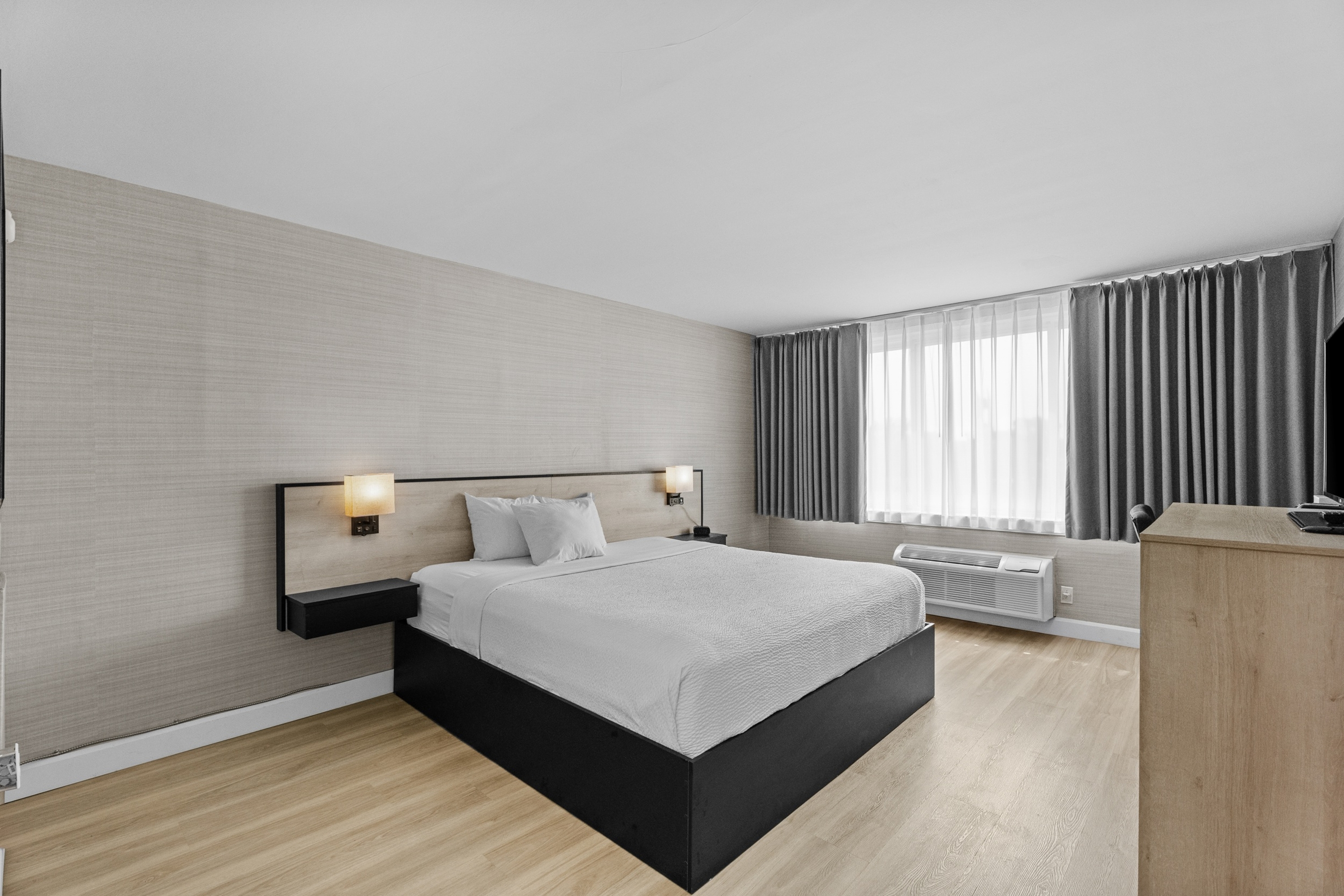 Guest room at the Ramada Plaza by Wyndham Montreal in Montreal, Quebec