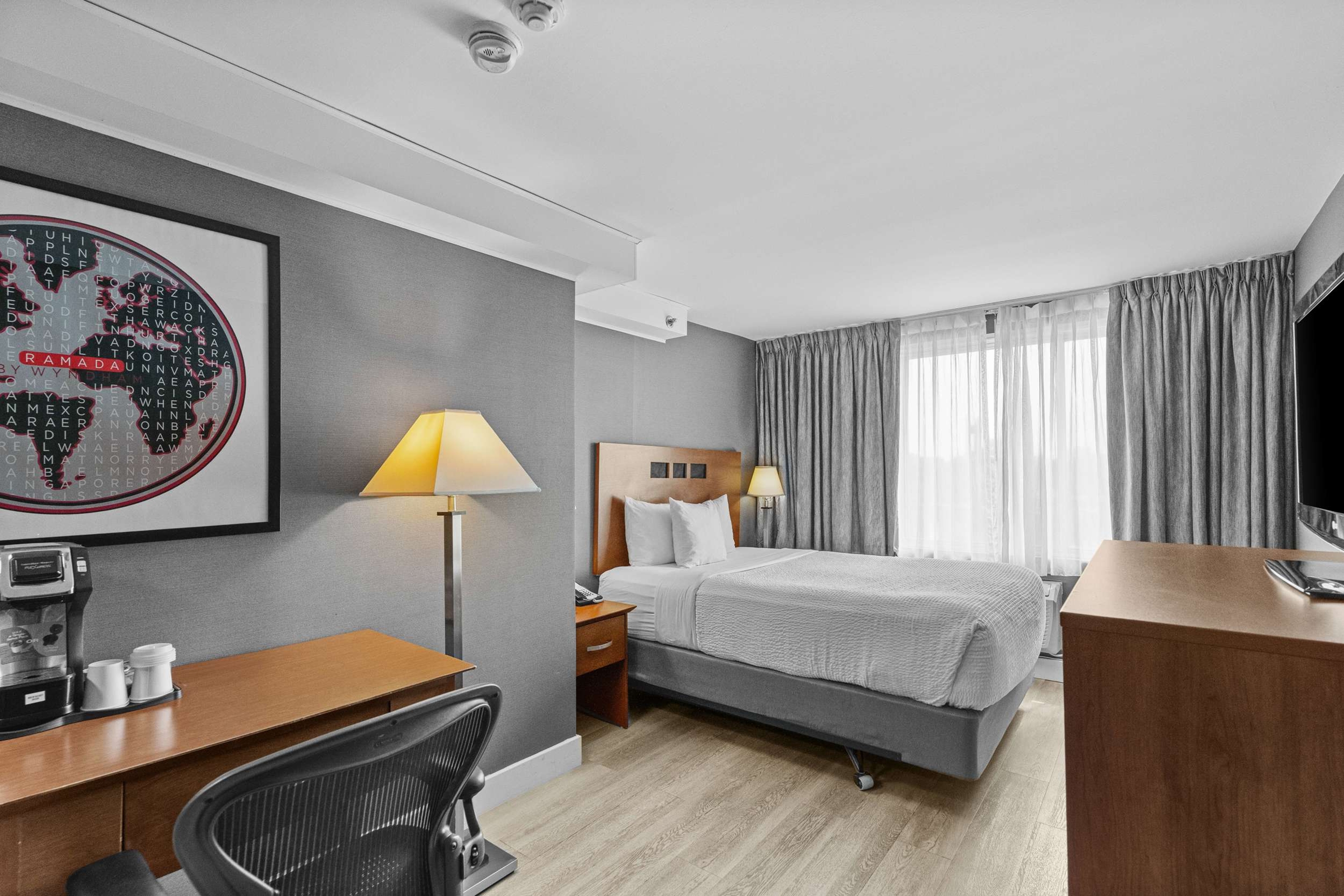 Guest room at the Ramada Plaza by Wyndham Montreal in Montreal, Quebec
