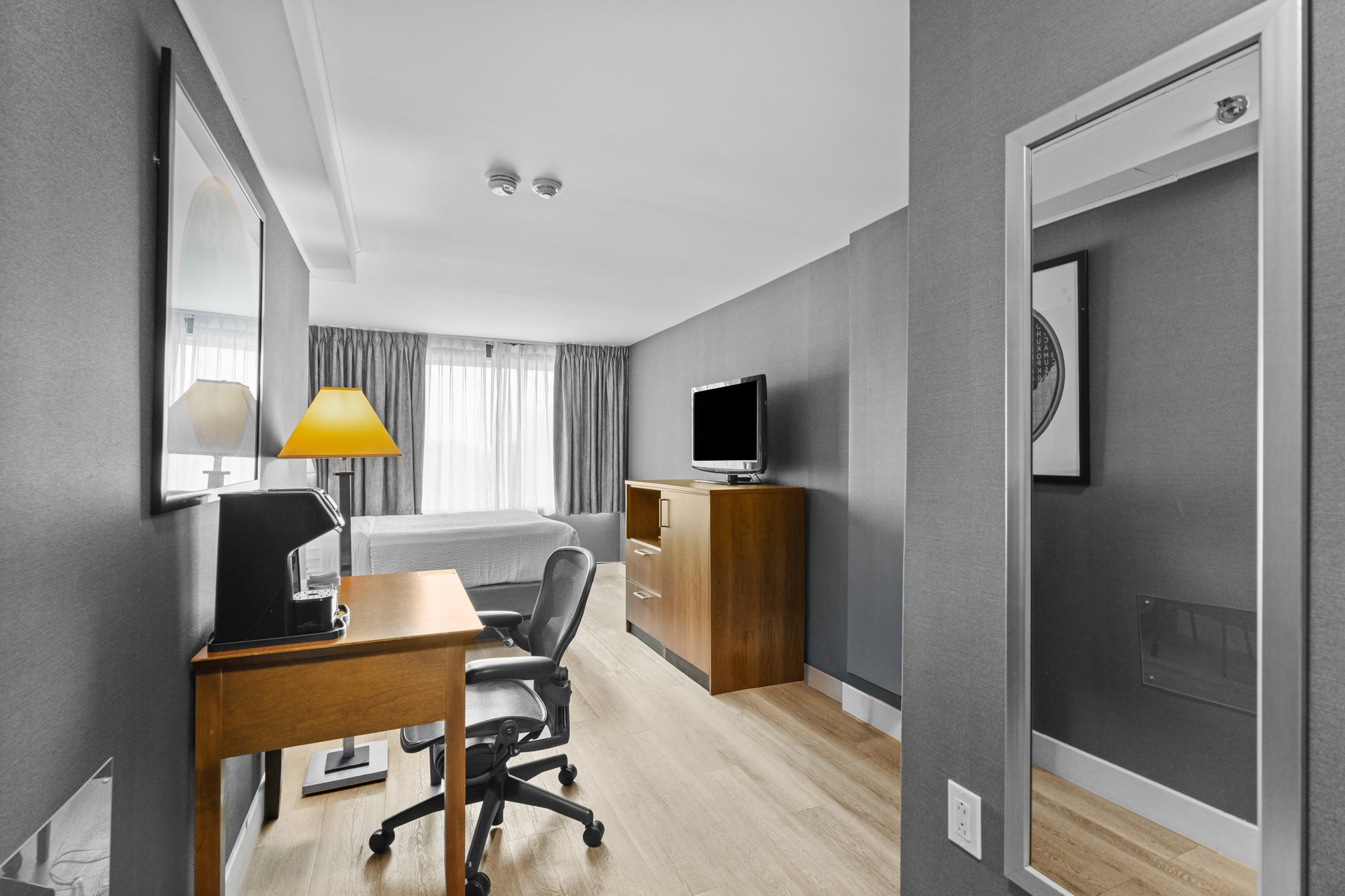Guest room at the Ramada Plaza by Wyndham Montreal in Montreal, Quebec