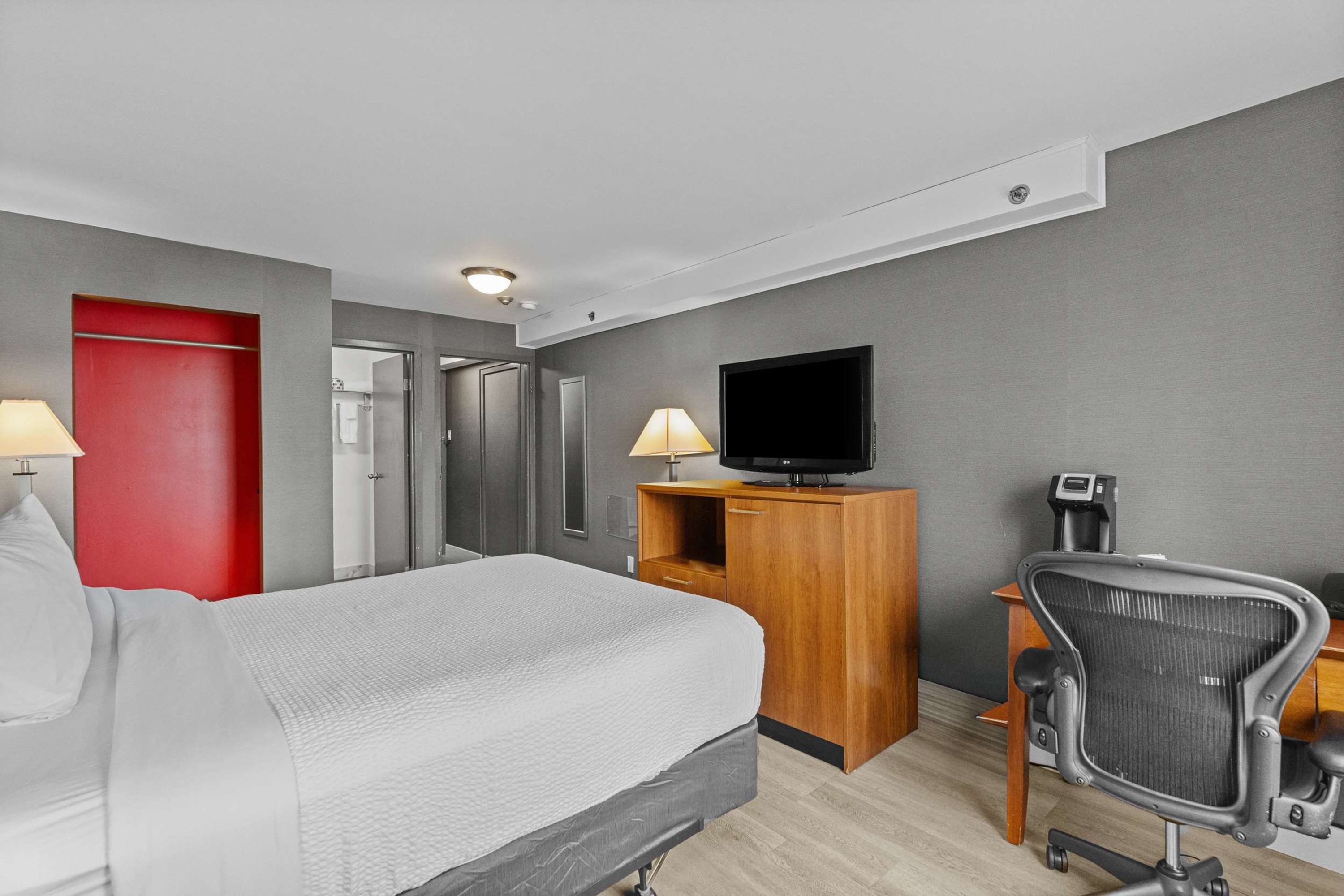 Guest room at the Ramada Plaza by Wyndham Montreal in Montreal, Quebec