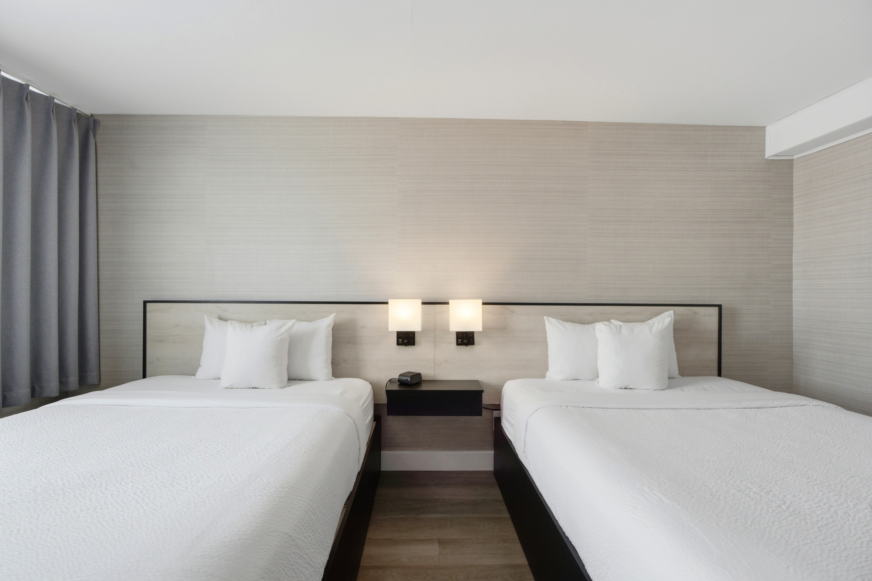 Guest room at the Ramada Plaza by Wyndham Montreal in Montreal, Quebec