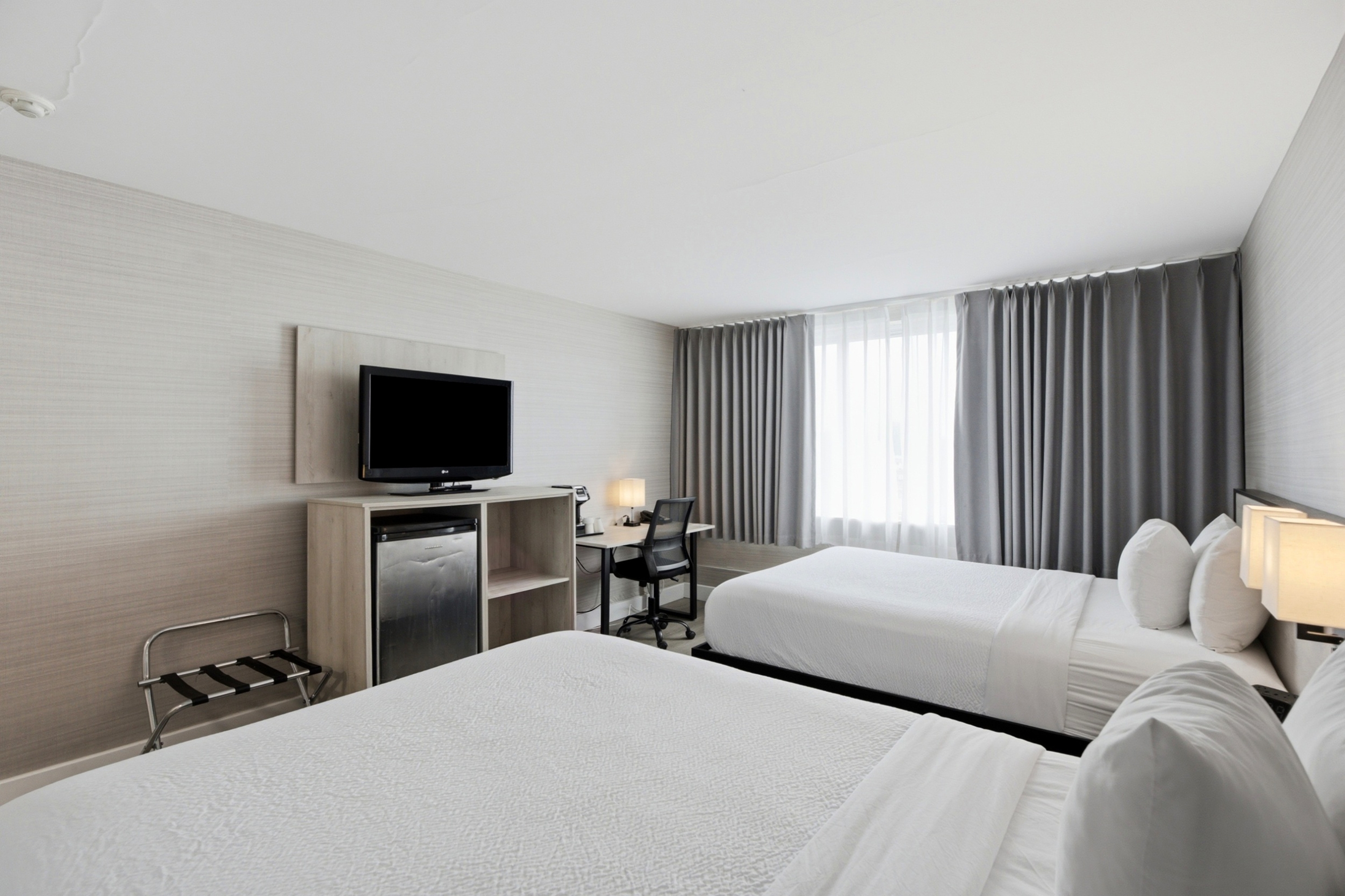 Guest room at the Ramada Plaza by Wyndham Montreal in Montreal, Quebec