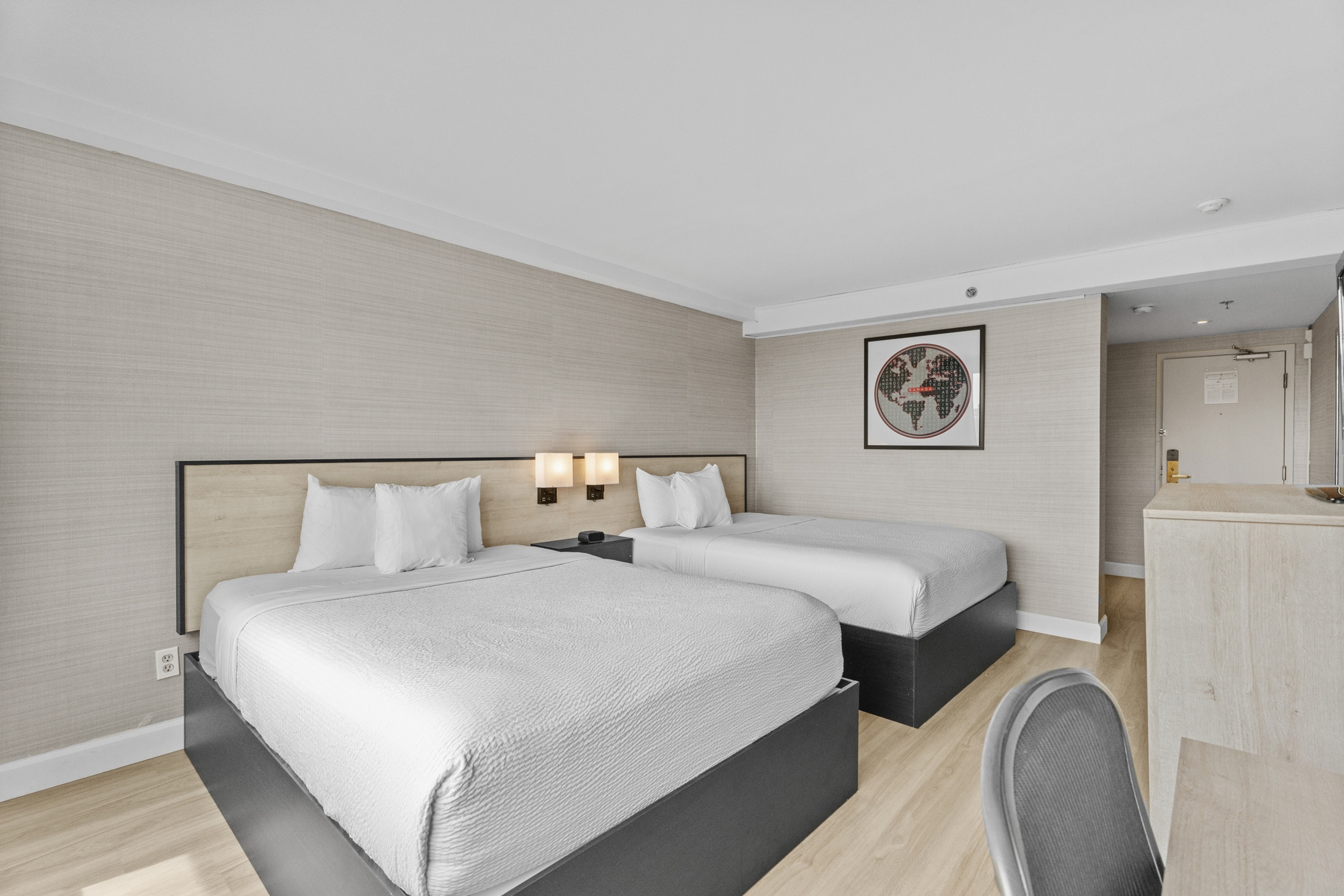 Guest room at the Ramada Plaza by Wyndham Montreal in Montreal, Quebec