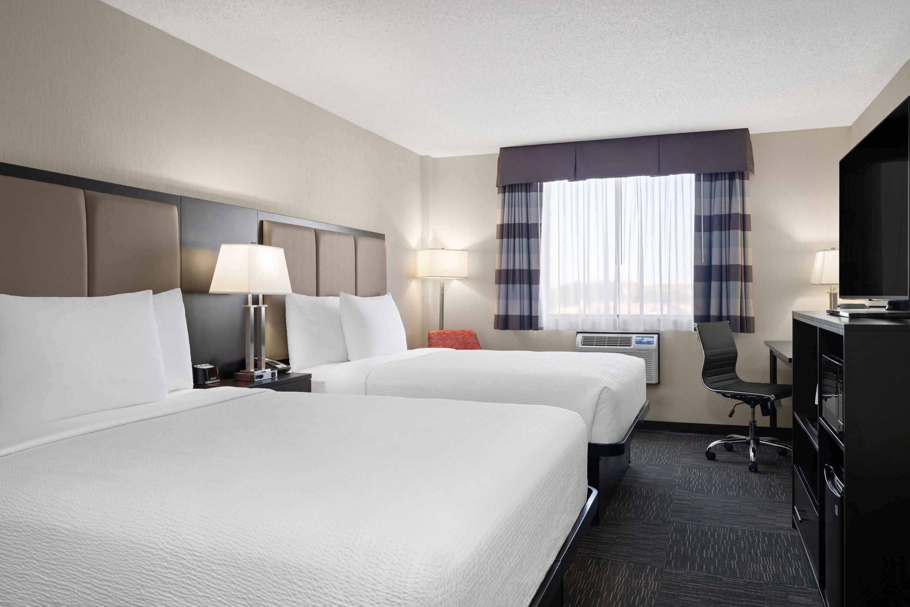 Guest room at the Ramada by Wyndham Saskatoon in Saskatoon, Saskatchewan