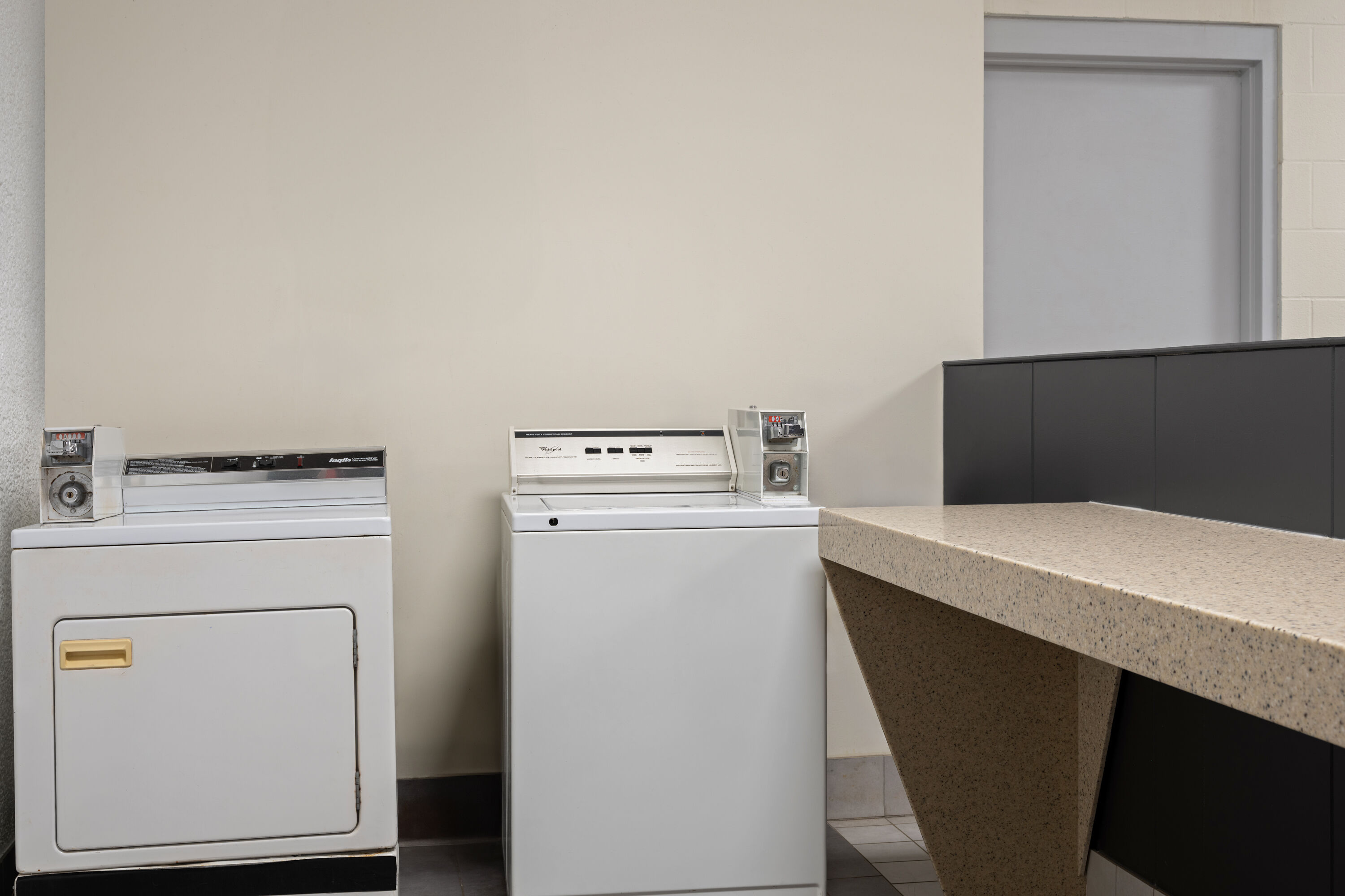 Laundry facilities at Ramada by Wyndham Saskatoon in Saskatoon, Saskatchewan