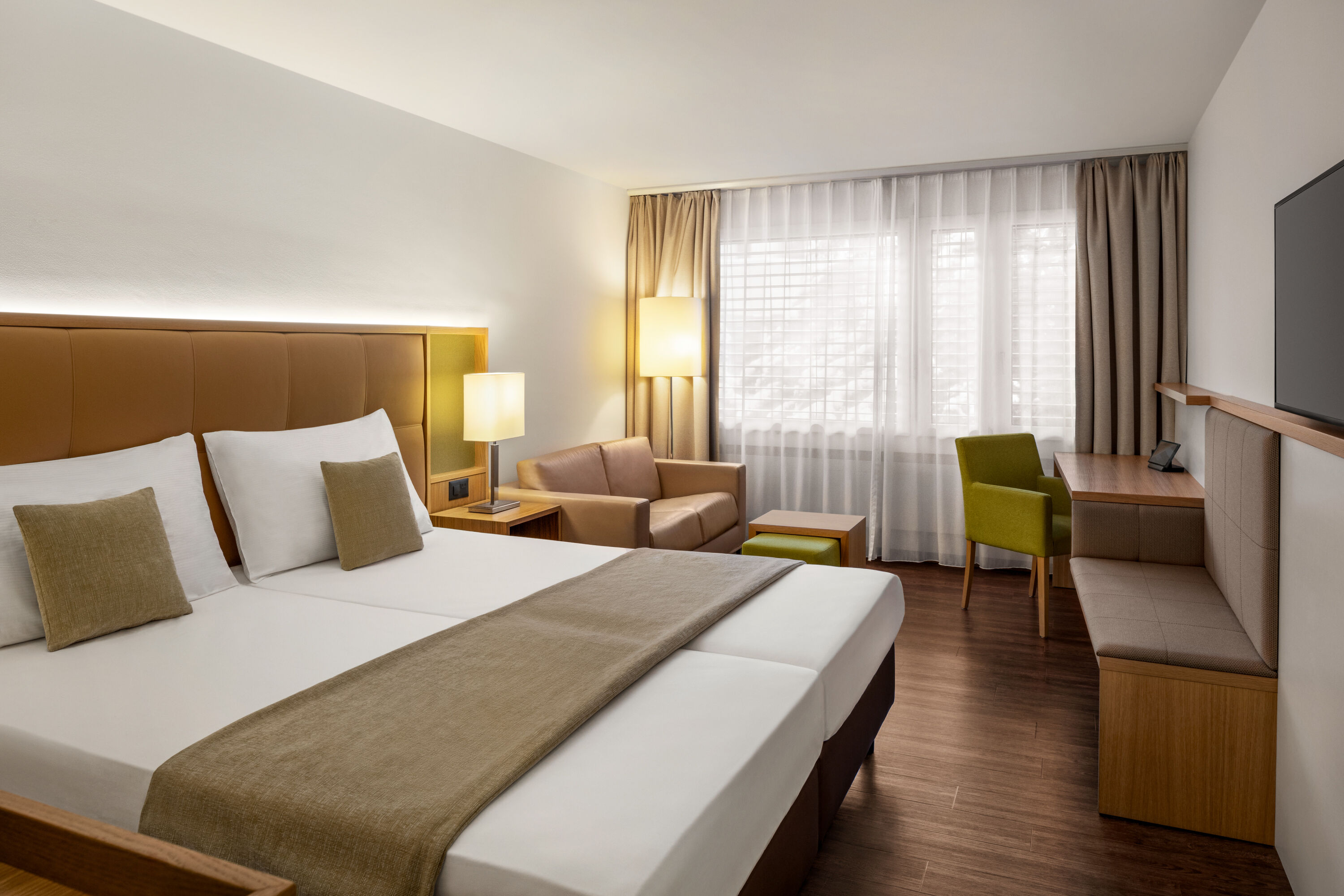 Guest room at the Ramada by Wyndham Baden du Parc in Baden, Other than US/Canada