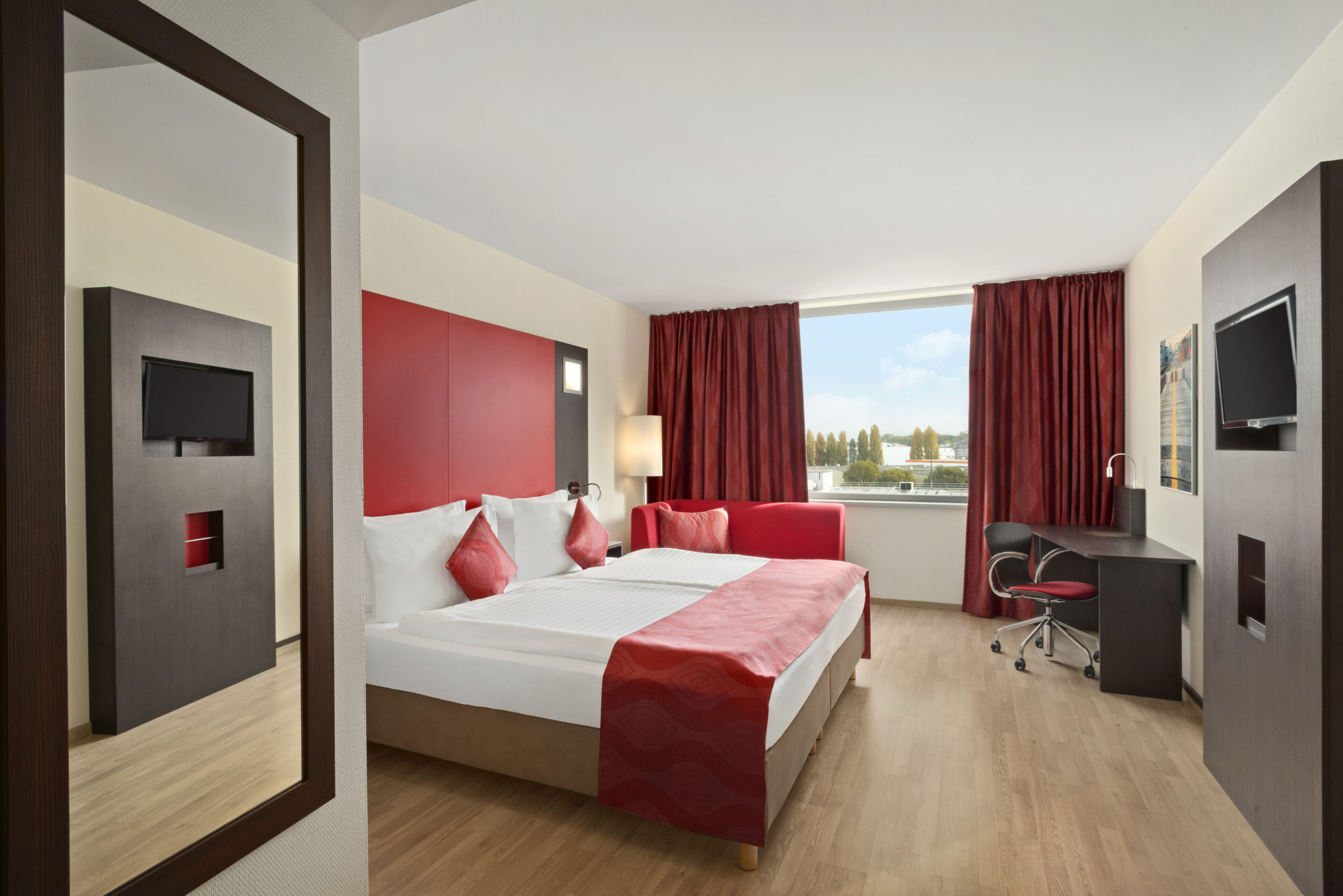 Guest room at the Ramada Encore by Wyndham Geneva in Geneve, Other than US/Canada