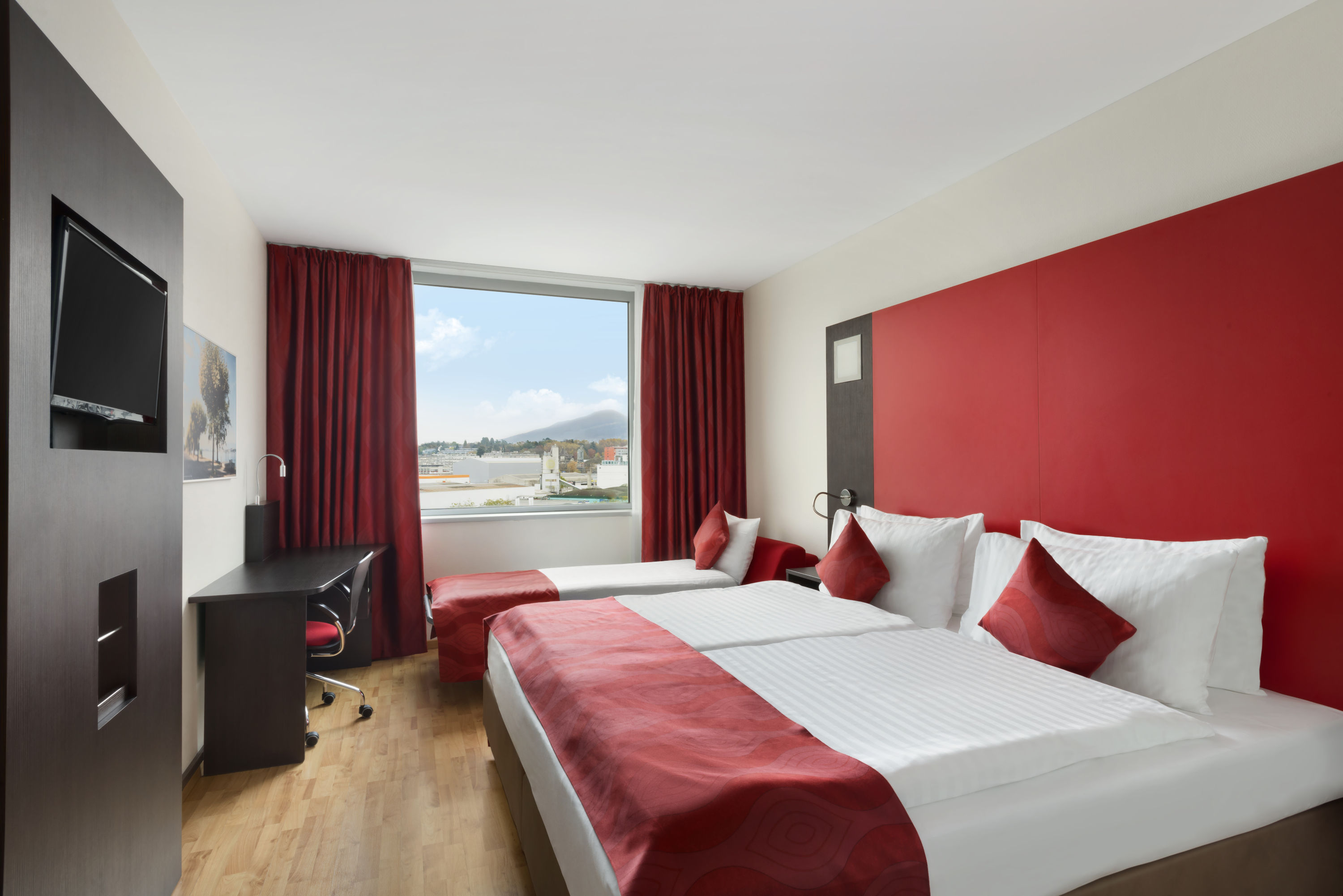 Guest room at the Ramada Encore by Wyndham Geneva in Geneve, Other than US/Canada