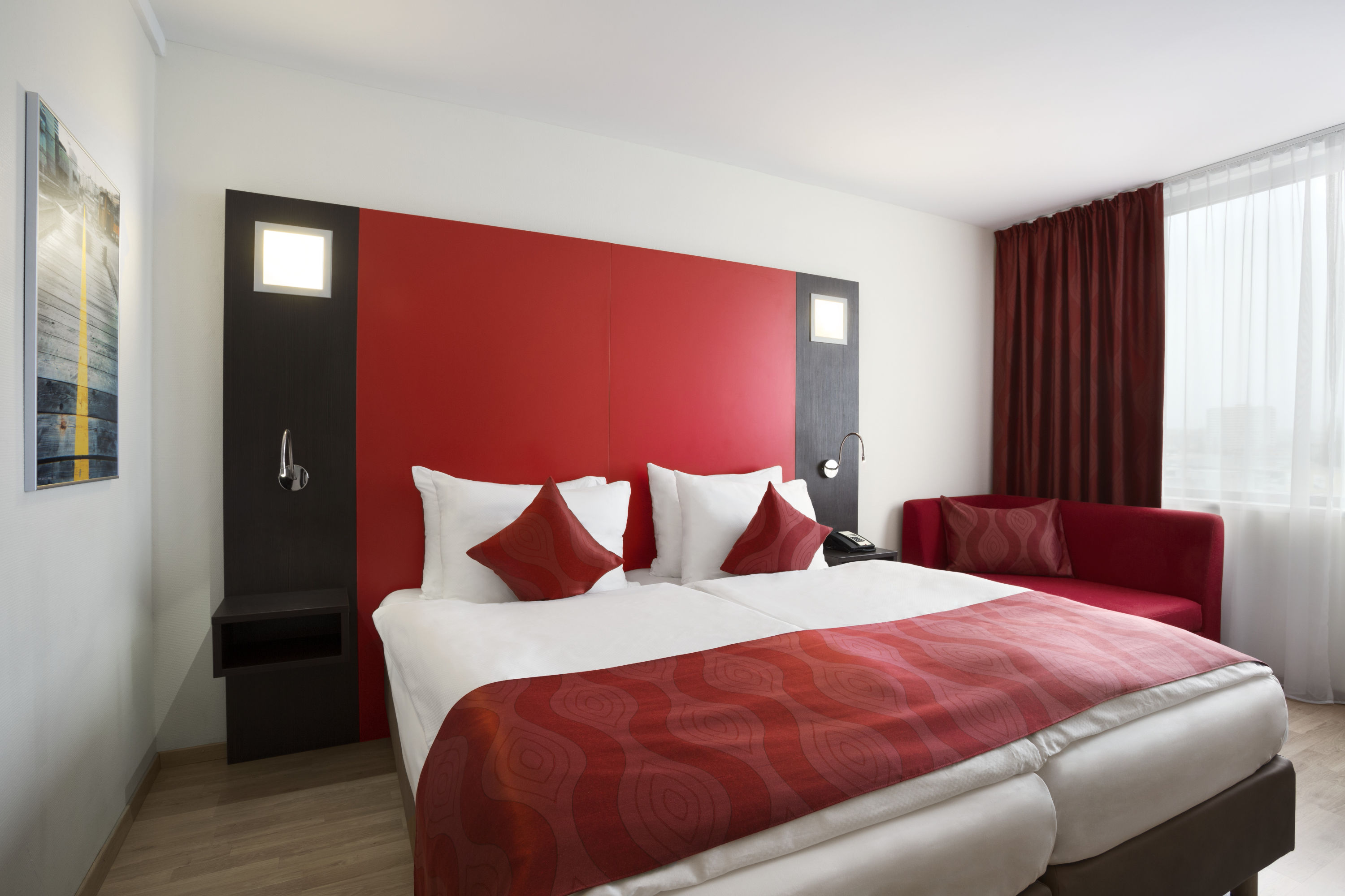 Guest room at the Ramada Encore by Wyndham Geneva in Geneve, Other than US/Canada