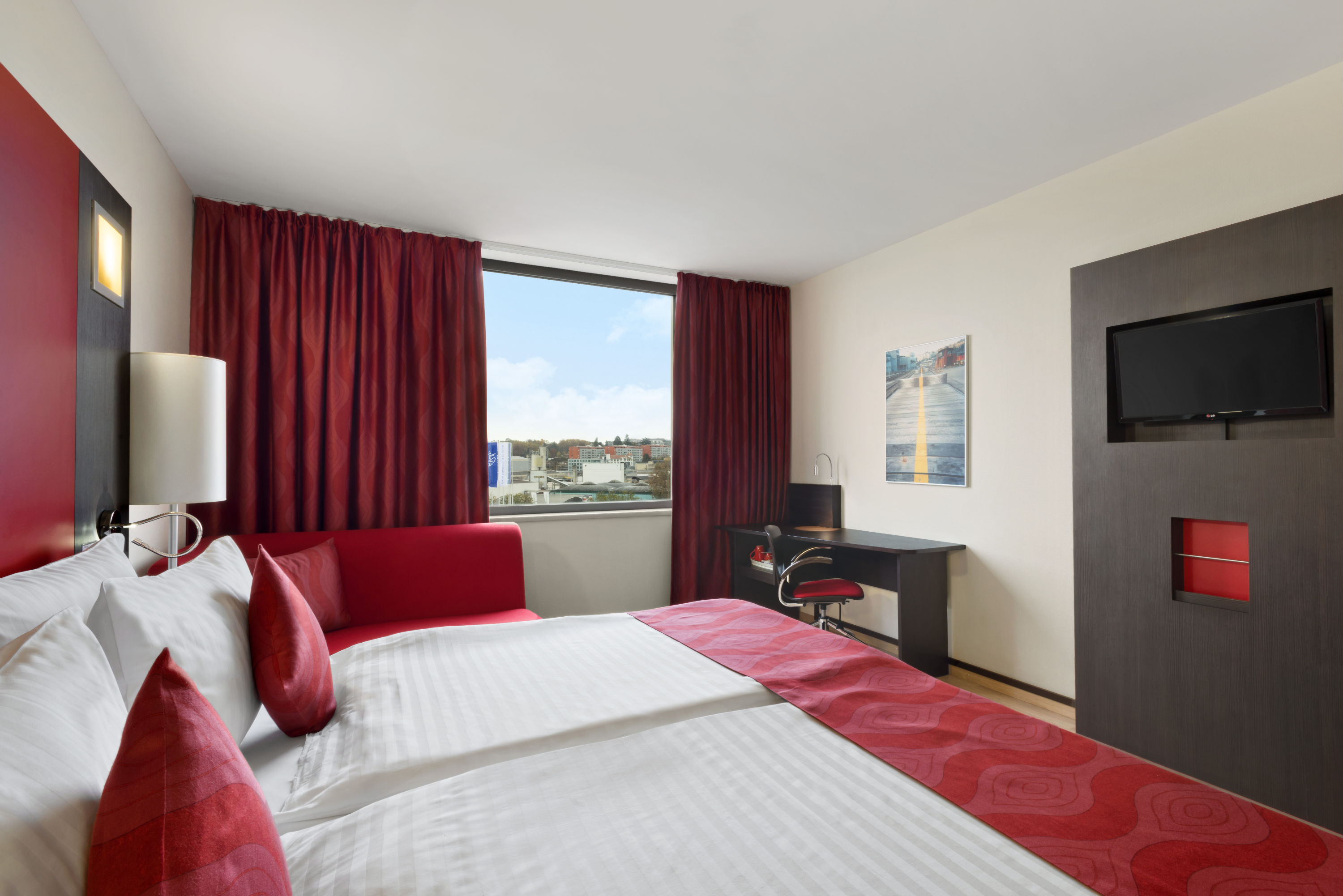 Guest room at the Ramada Encore by Wyndham Geneva in Geneve, Other than US/Canada