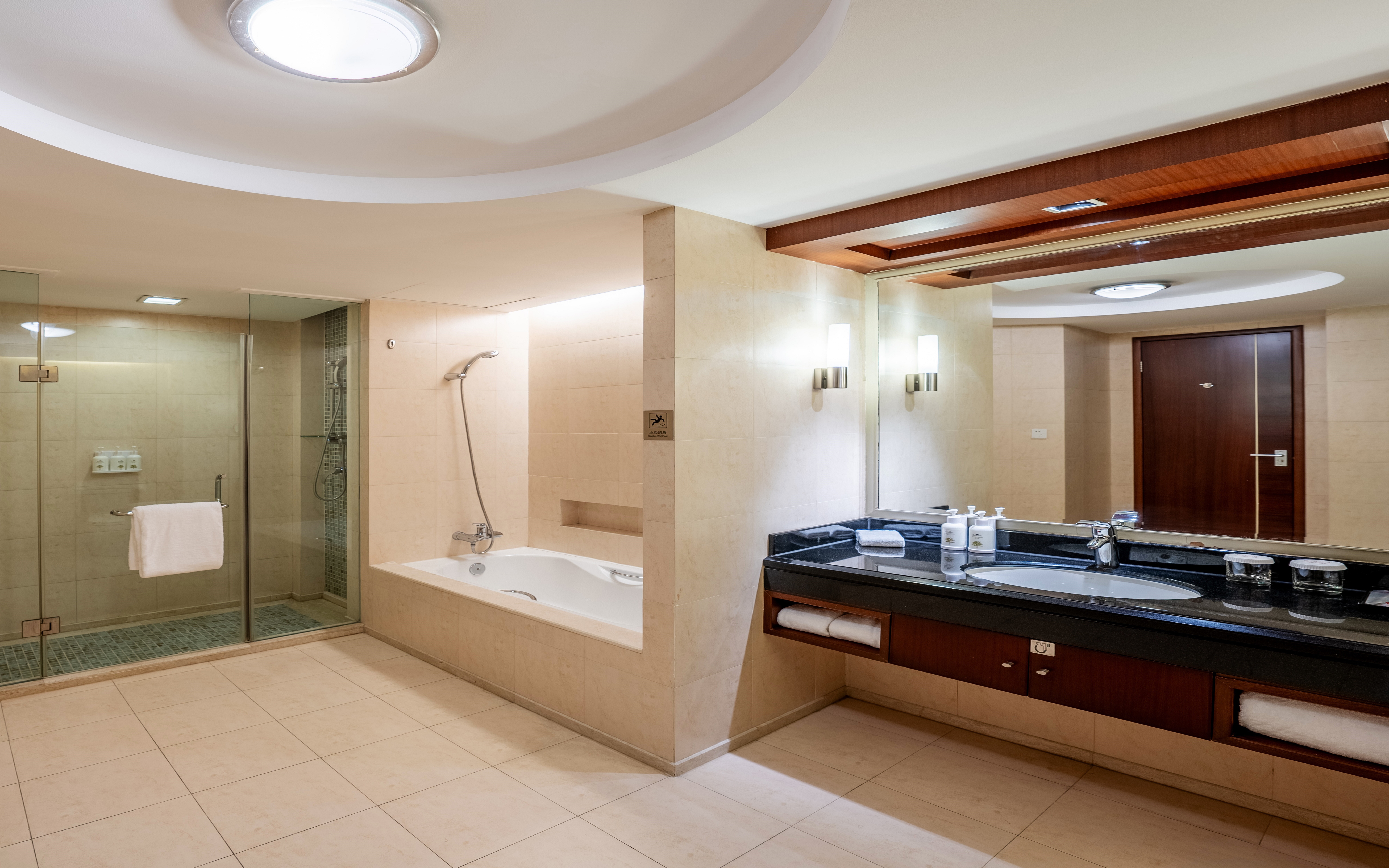 Guest room bath at the Ramada by Wyndham Beijing North in Beijing, Other than US/Canada