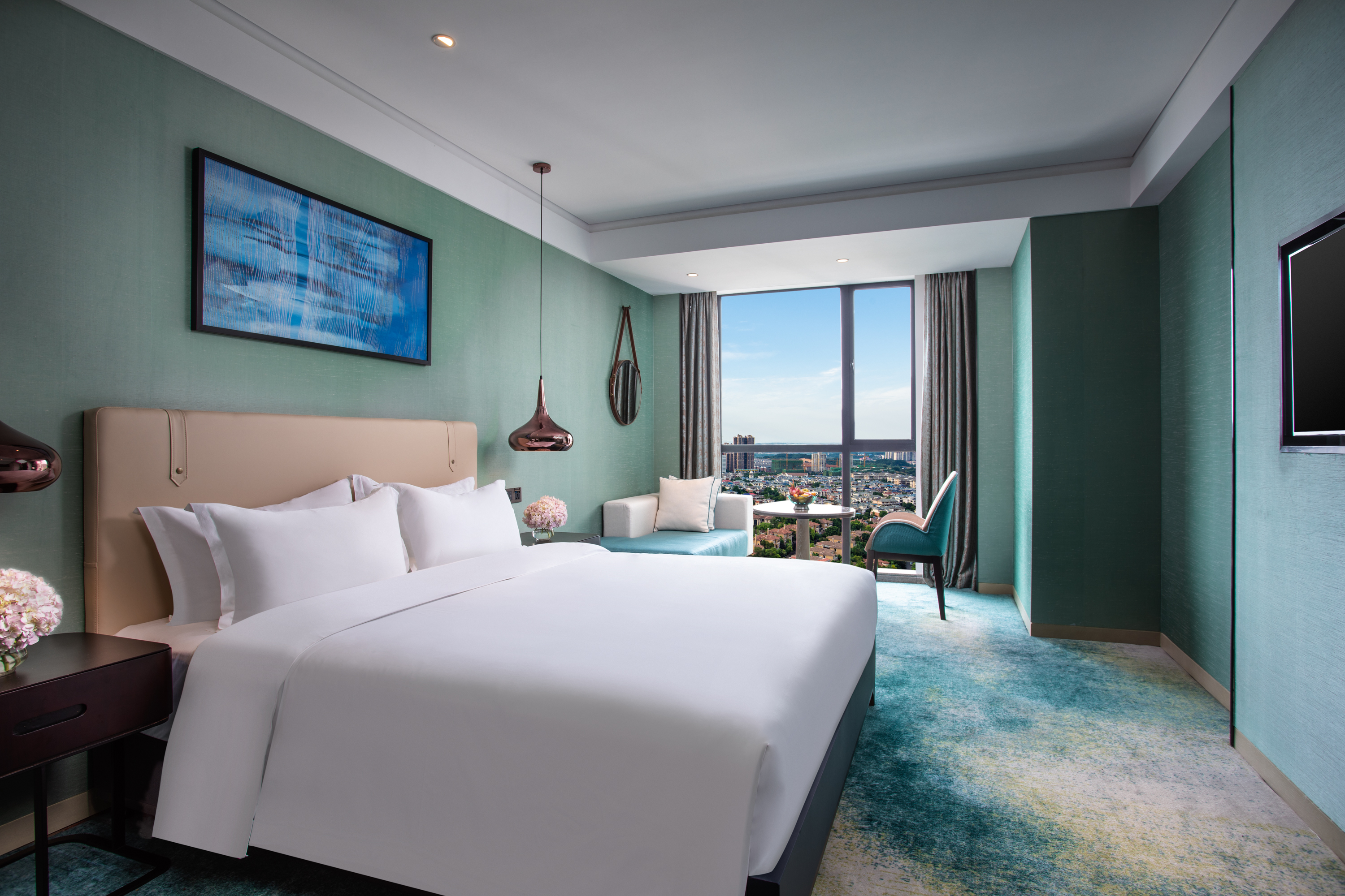 Guest room at the Ramada Plaza by Wyndham Changsha Xingsha in Changsha, Other than US/Canada