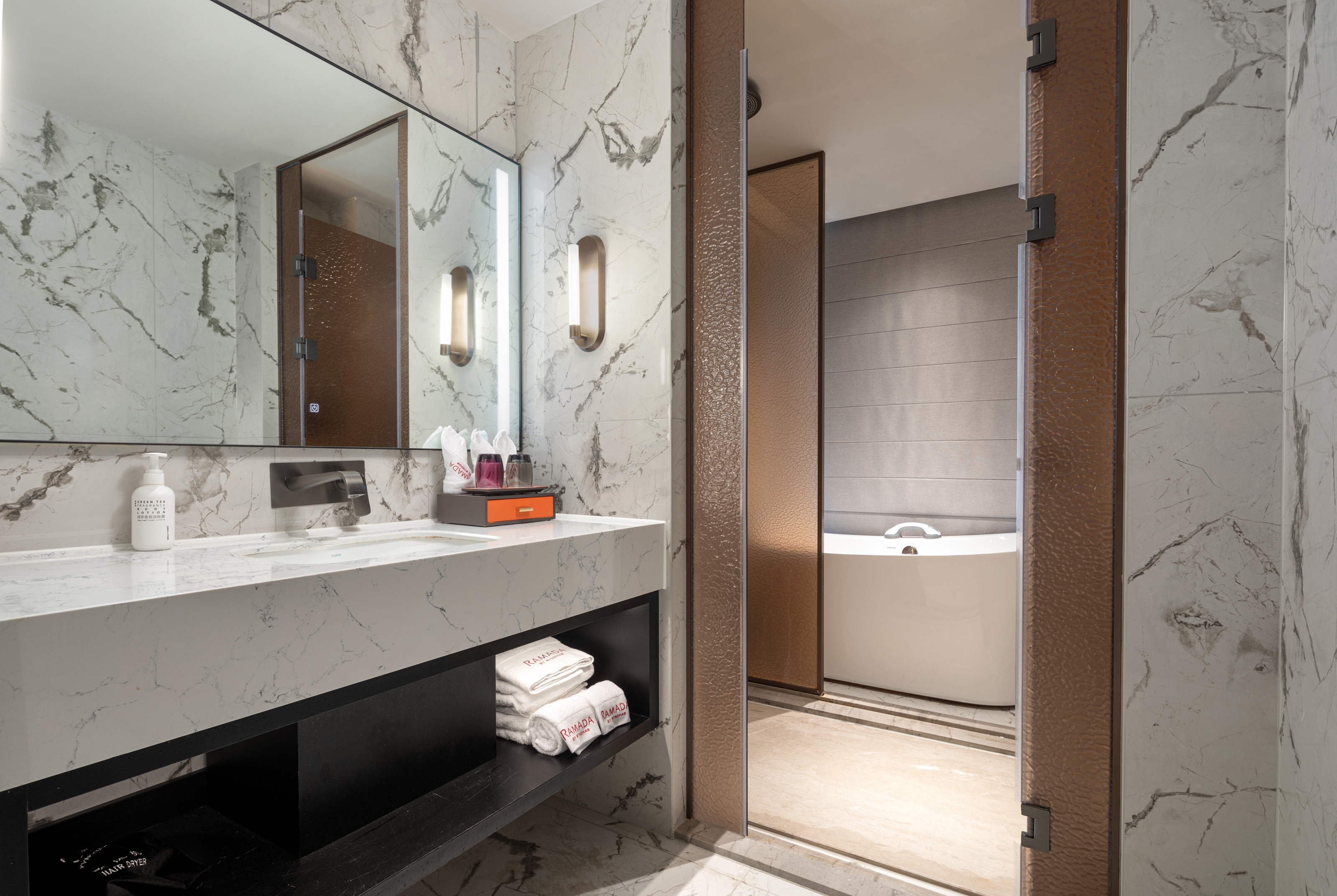 Guest room bath at the Ramada by Wyndham Changsha Yanghu in Changsha, Other than US/Canada