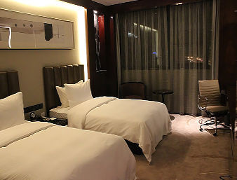 Guest room at the Ramada by Wyndham Changzhou North in Changzhou, Other than US/Canada