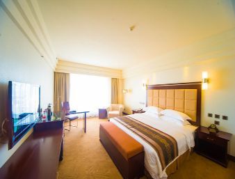 Guest room at the Ramada by Wyndham Chengdu North in Chengdu, Other than US/Canada