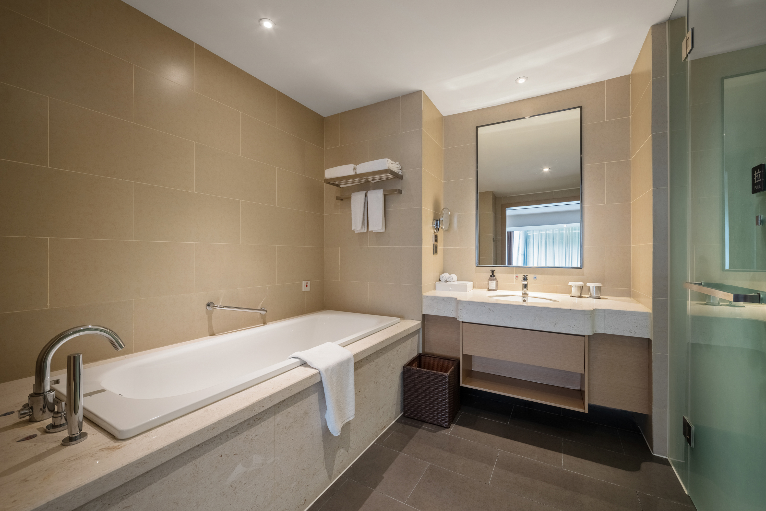 Guest room bath at the Ramada Encore by Wyndham Jintang in Chengdu, Other than US/Canada