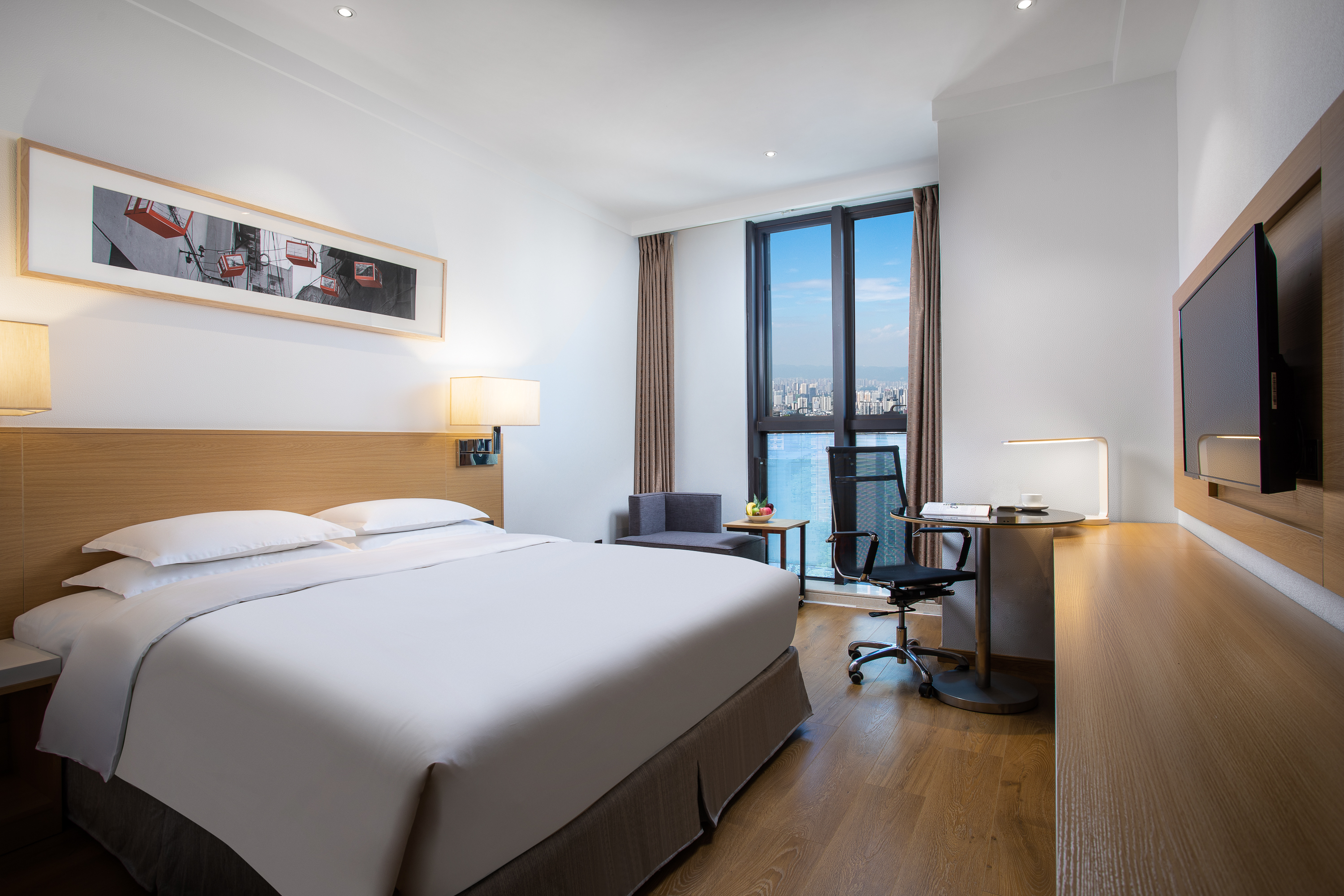 King bed guest room at the Ramada Encore by Wyndham Chongqing Yubei in Chongqing, Other than US/Canada