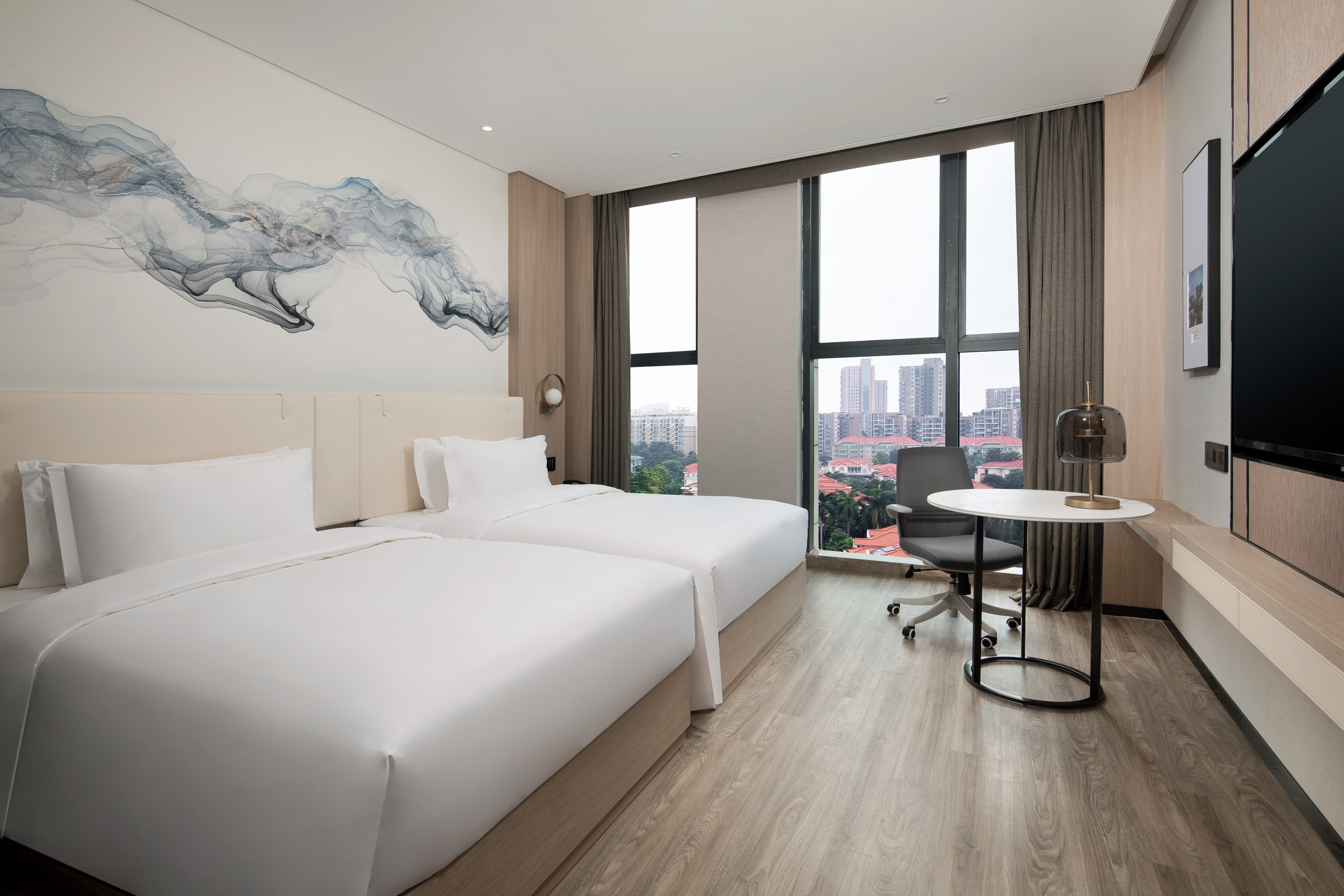 Guest room at the Ramada Encore by Wyndham Dongguan East in Dongguan, Other than US/Canada