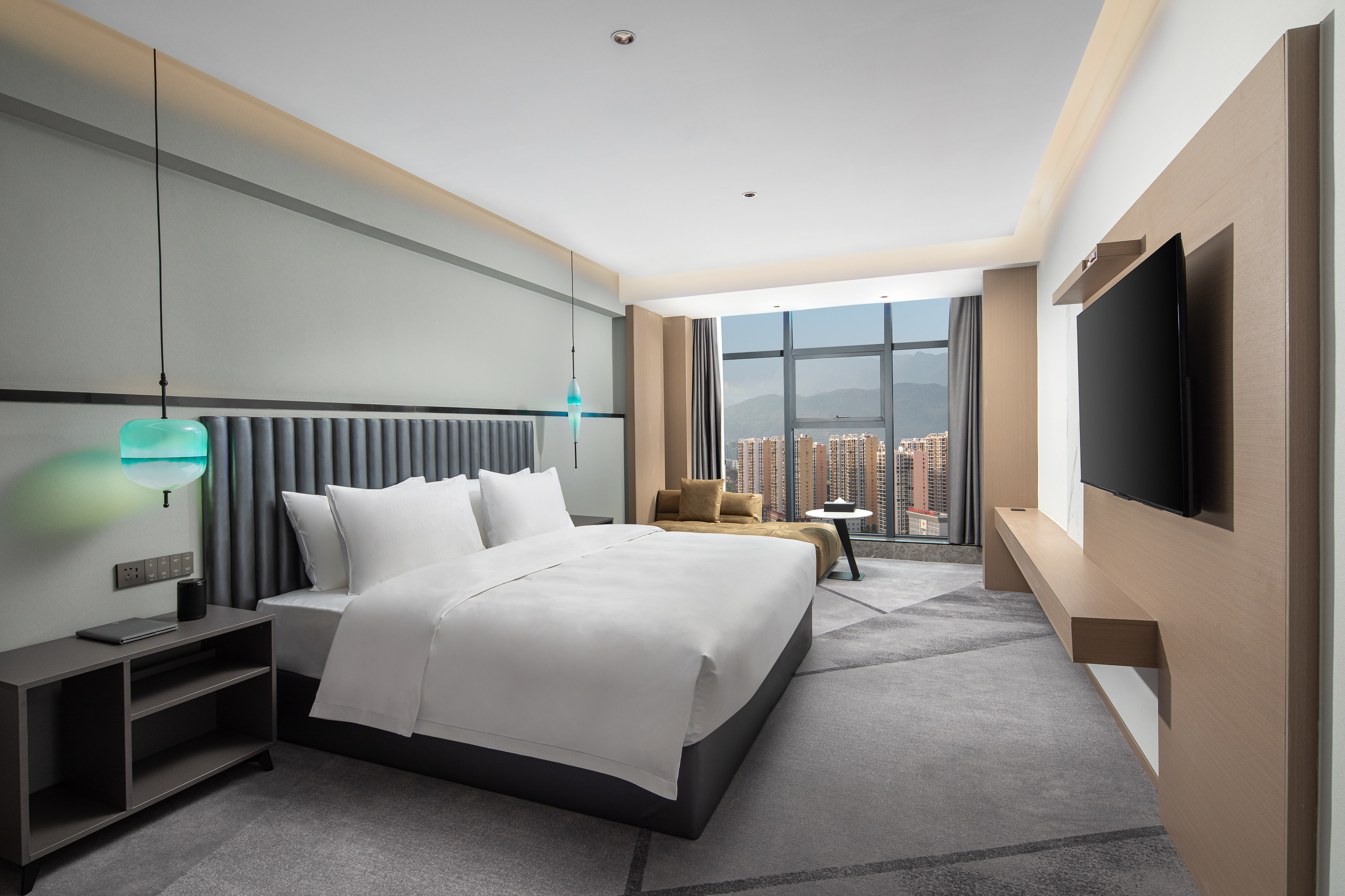 Guest room at the Ramada Encore by Wyndham Enshi in Enshi, Other than US/Canada