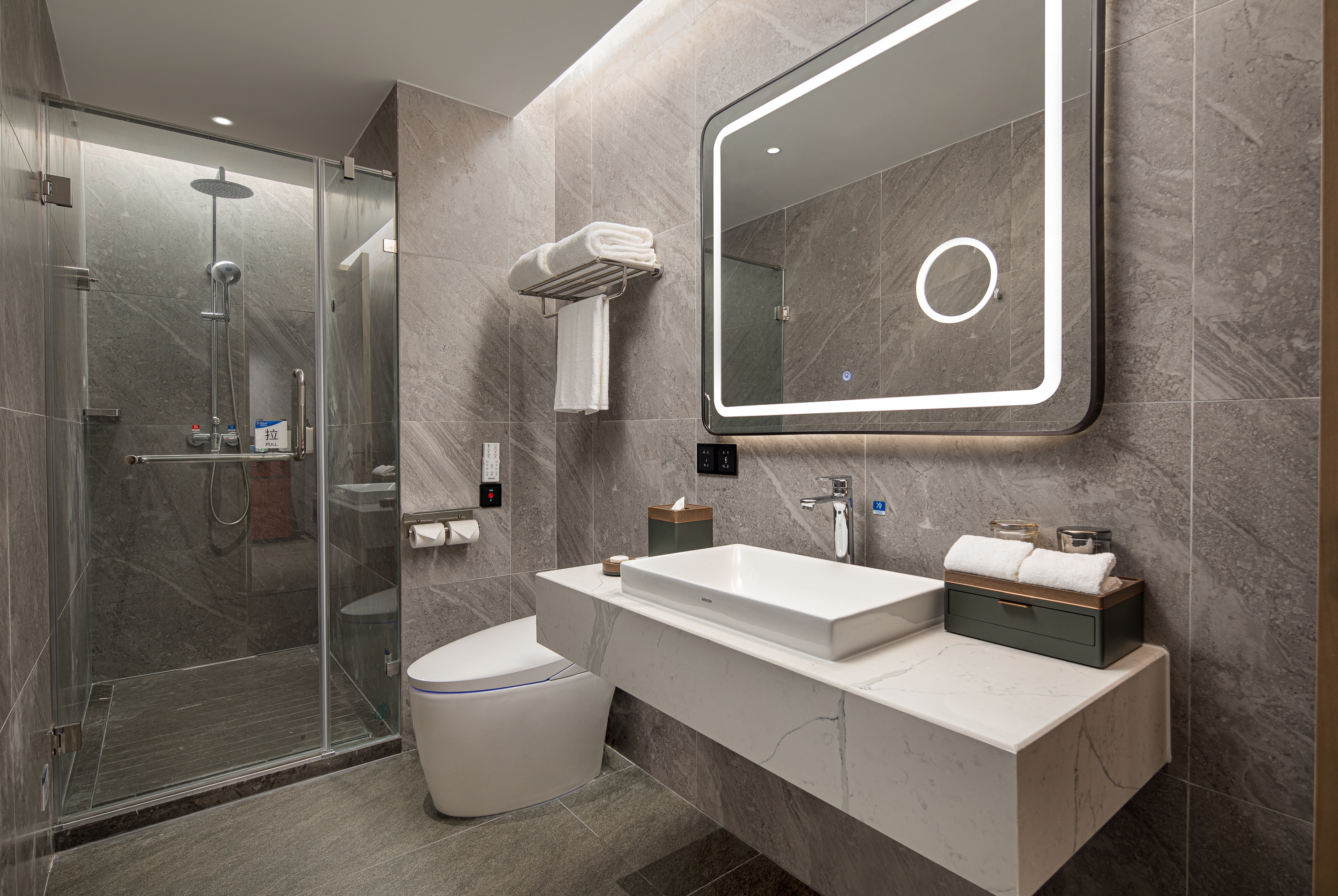 Guest room bath at the Ramada Encore by Wyndham Foshan Chancheng in Foshan, Other than US/Canada
