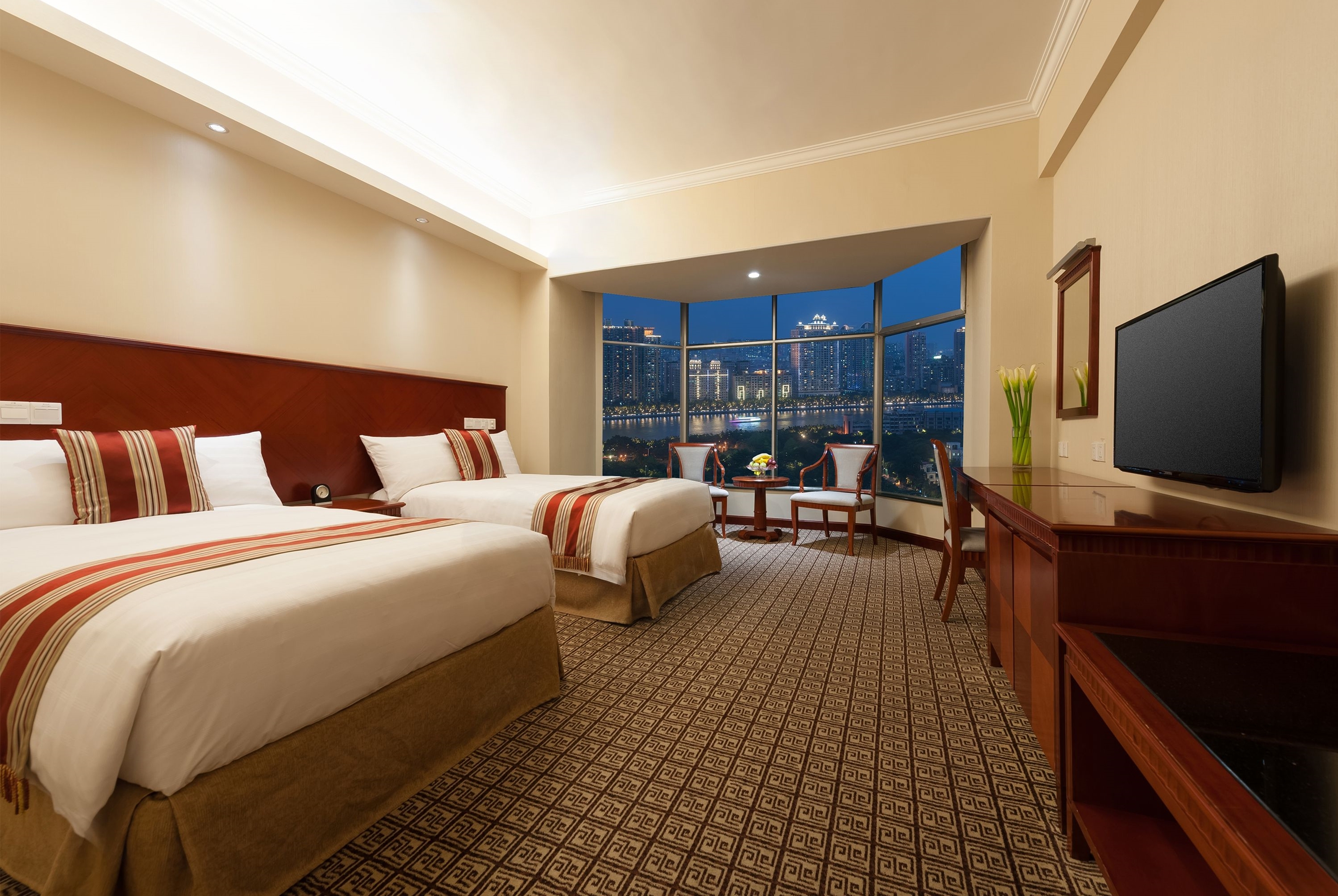 Guest room at the Ramada by Wyndham Pearl Guangzhou in Guangzhou, Other than US/Canada